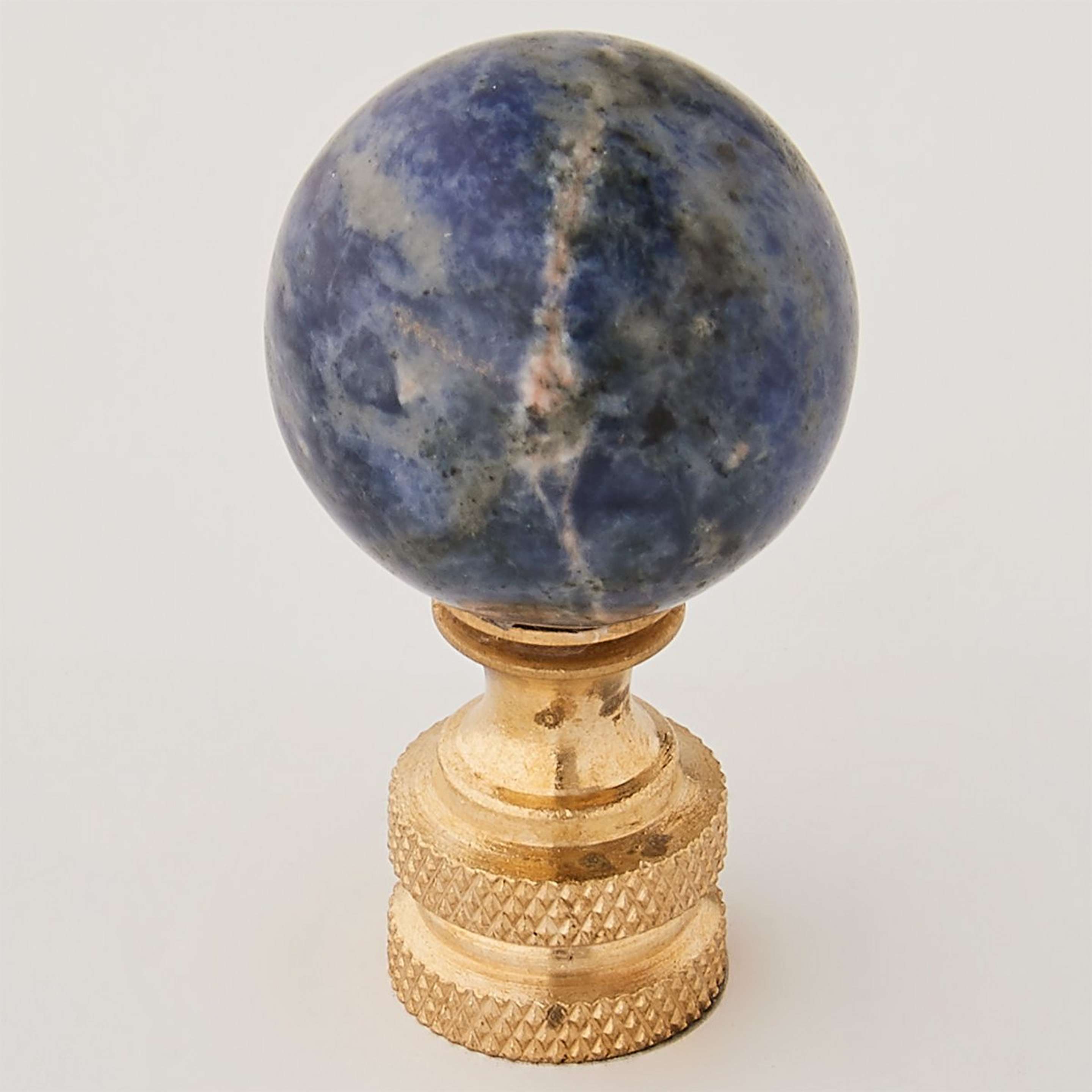 A Blue Sodalite Finial with Speckled Navy / Brass color