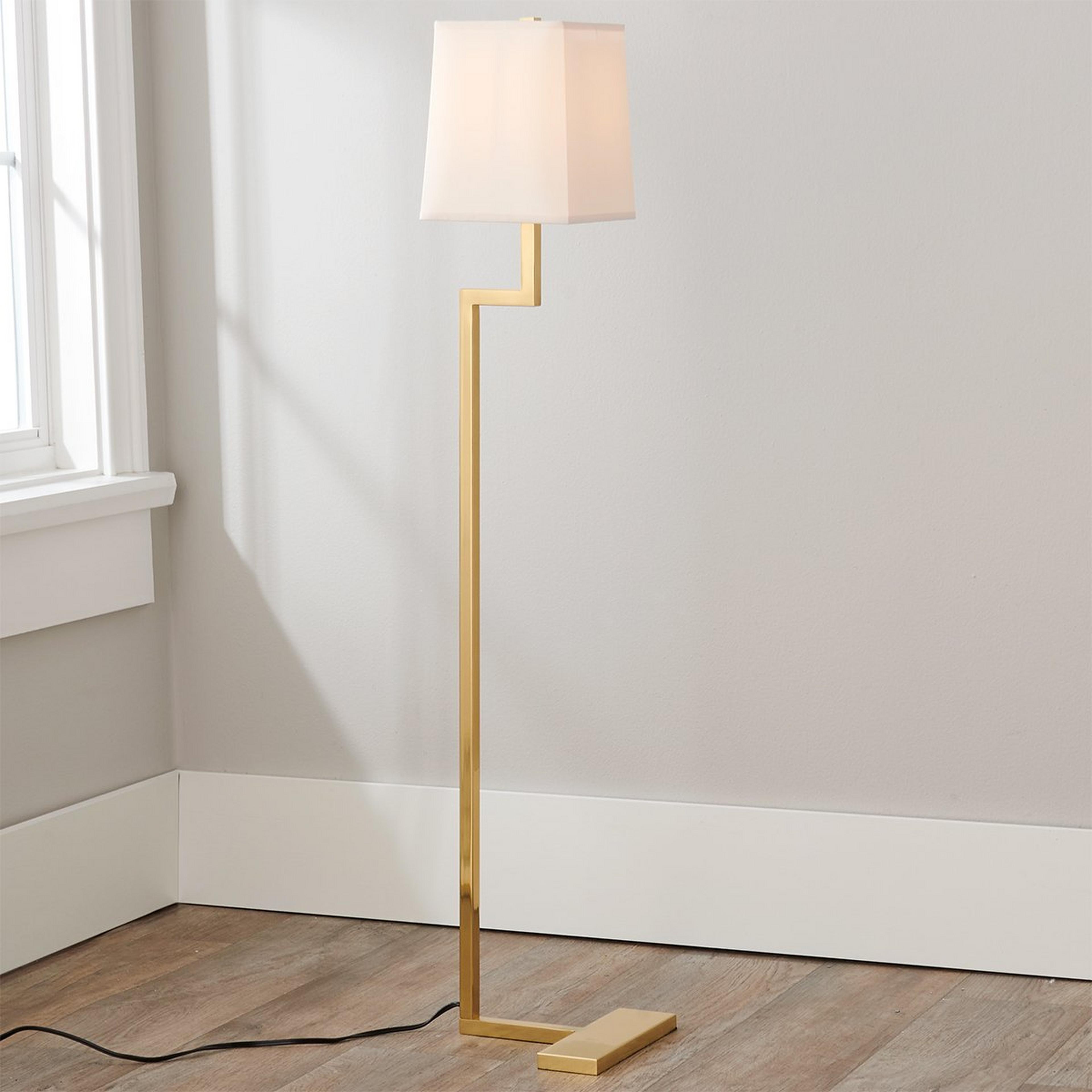 A Times Square Floor Lamp with Polished Brass color
