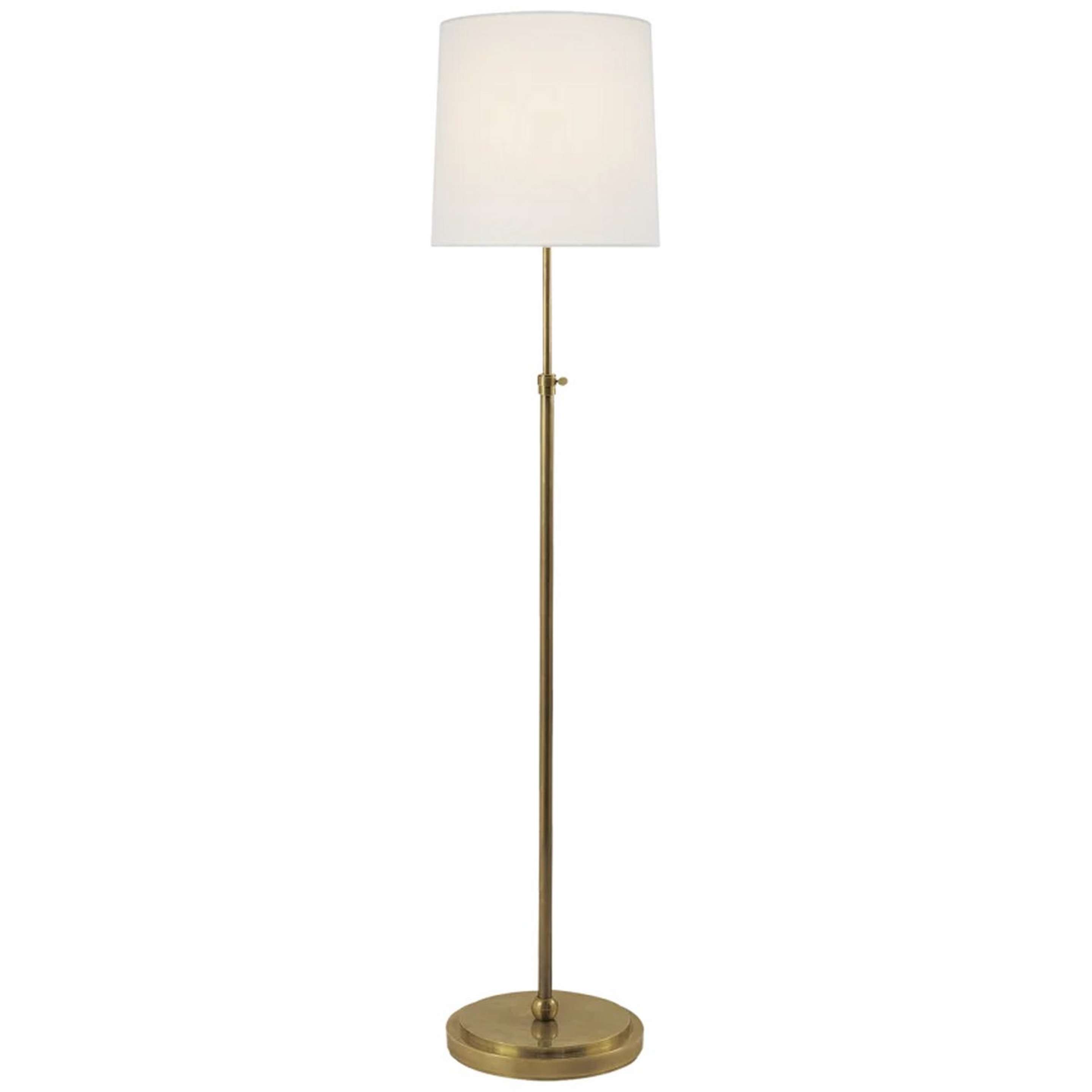 A Soho Adjustable Floor Lamp with Hand-Rubbed Antique Brass color
