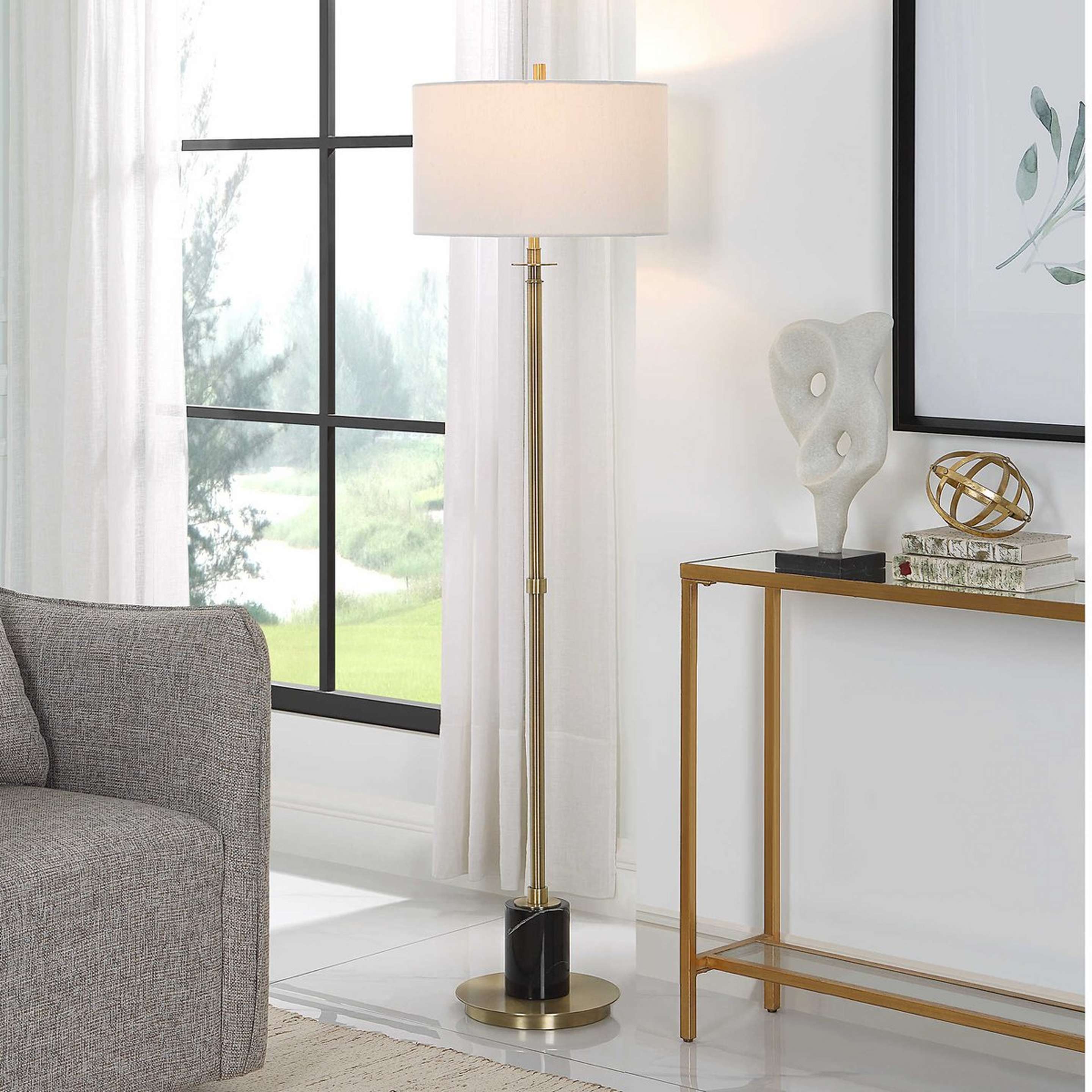A Catrino Floor Lamp with Antique Brass / Black Marble color