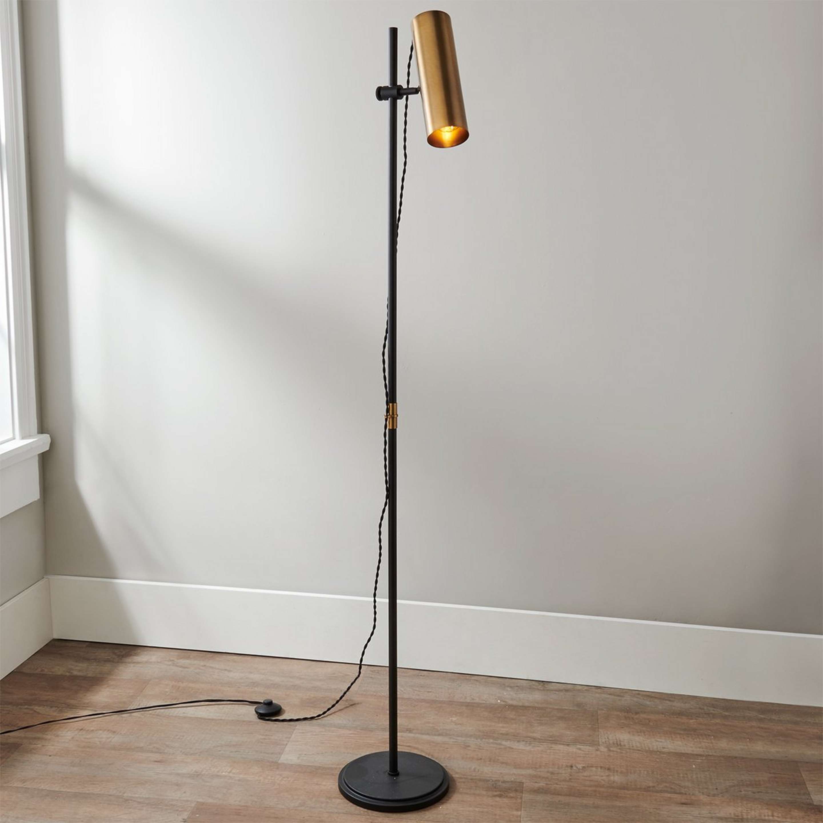 A Rosenthal Floor Lamp with Black / Brushed Brass color