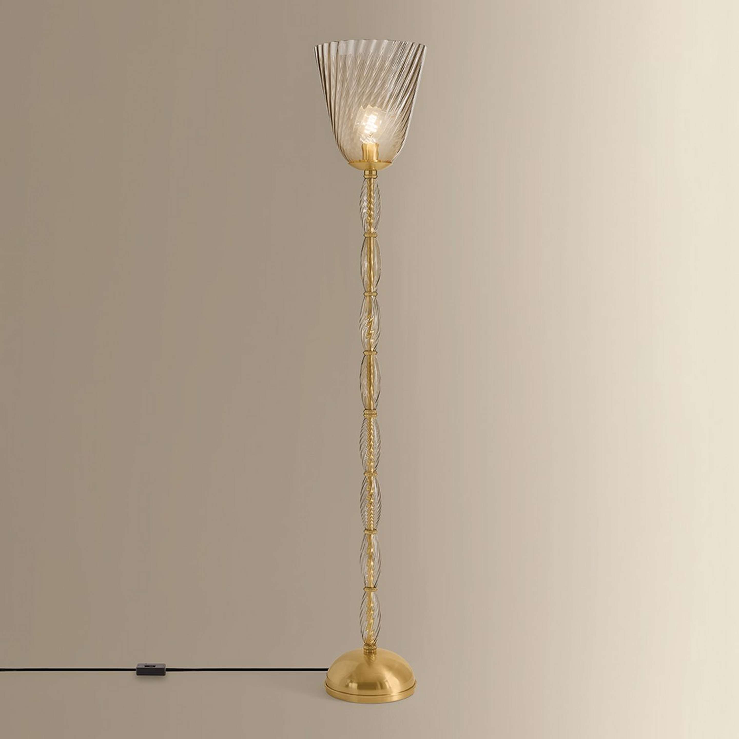 A Releve Floor Lamp with Brown Smoked Glass / Brass color