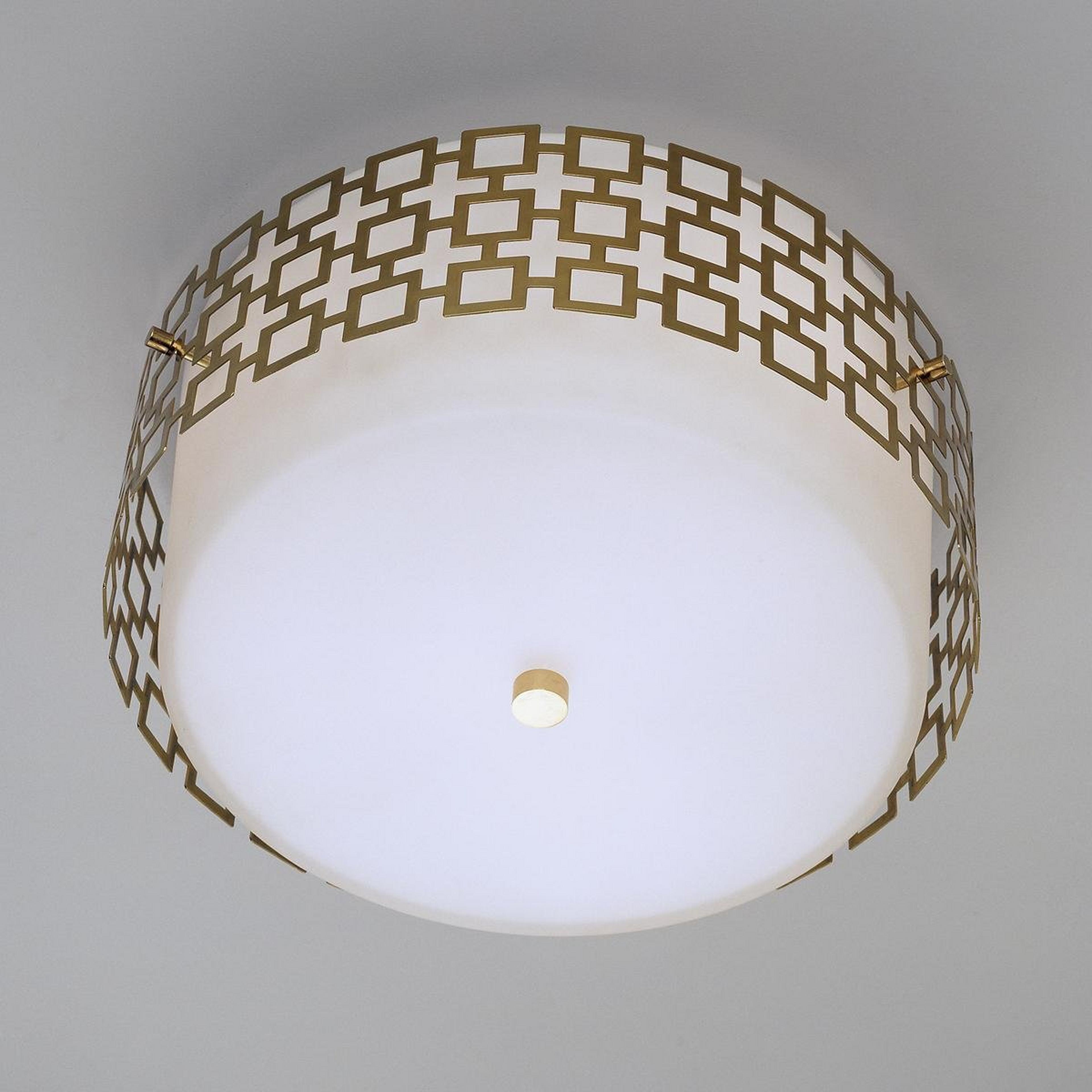 A Jonathan Adler Ceiling Light with Antique Brass color