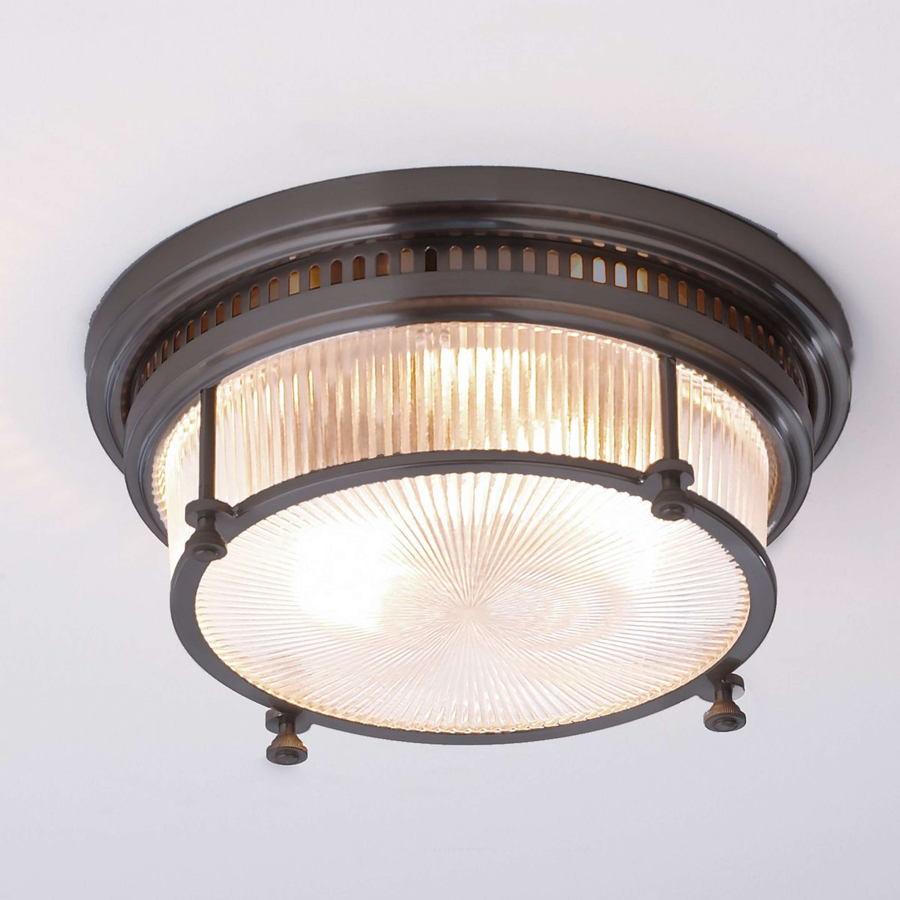 A Fresnel Glass Industrial Ceiling Light with Bronze color