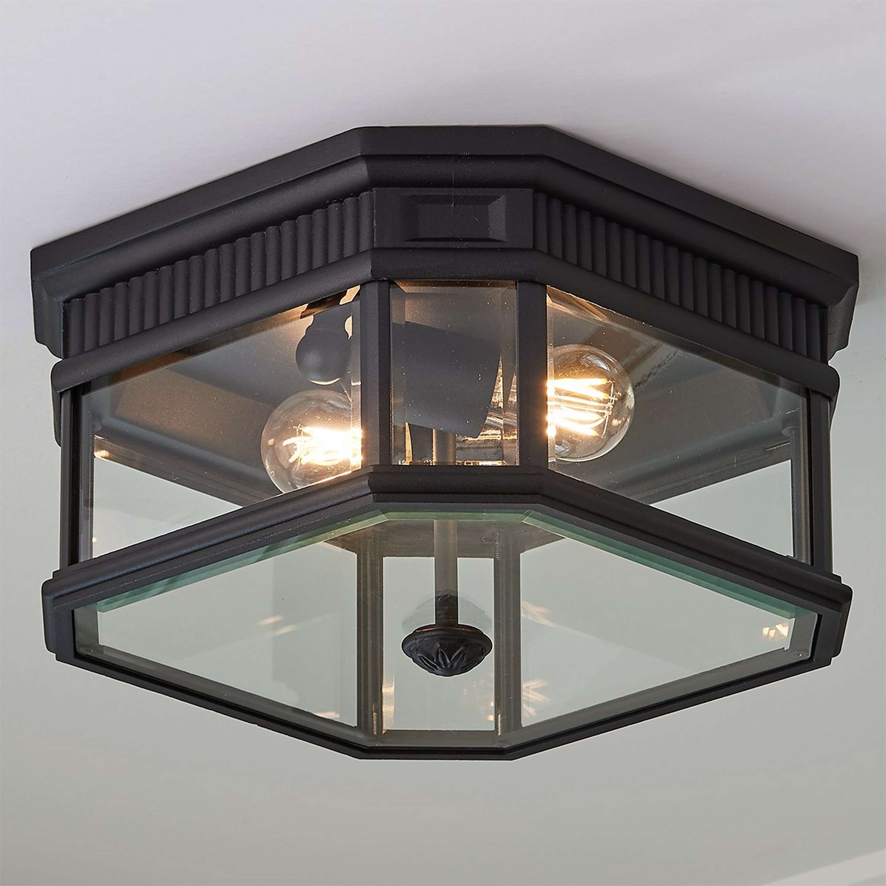 A Fluted Trim Flush Mount Ceiling Light with Black color