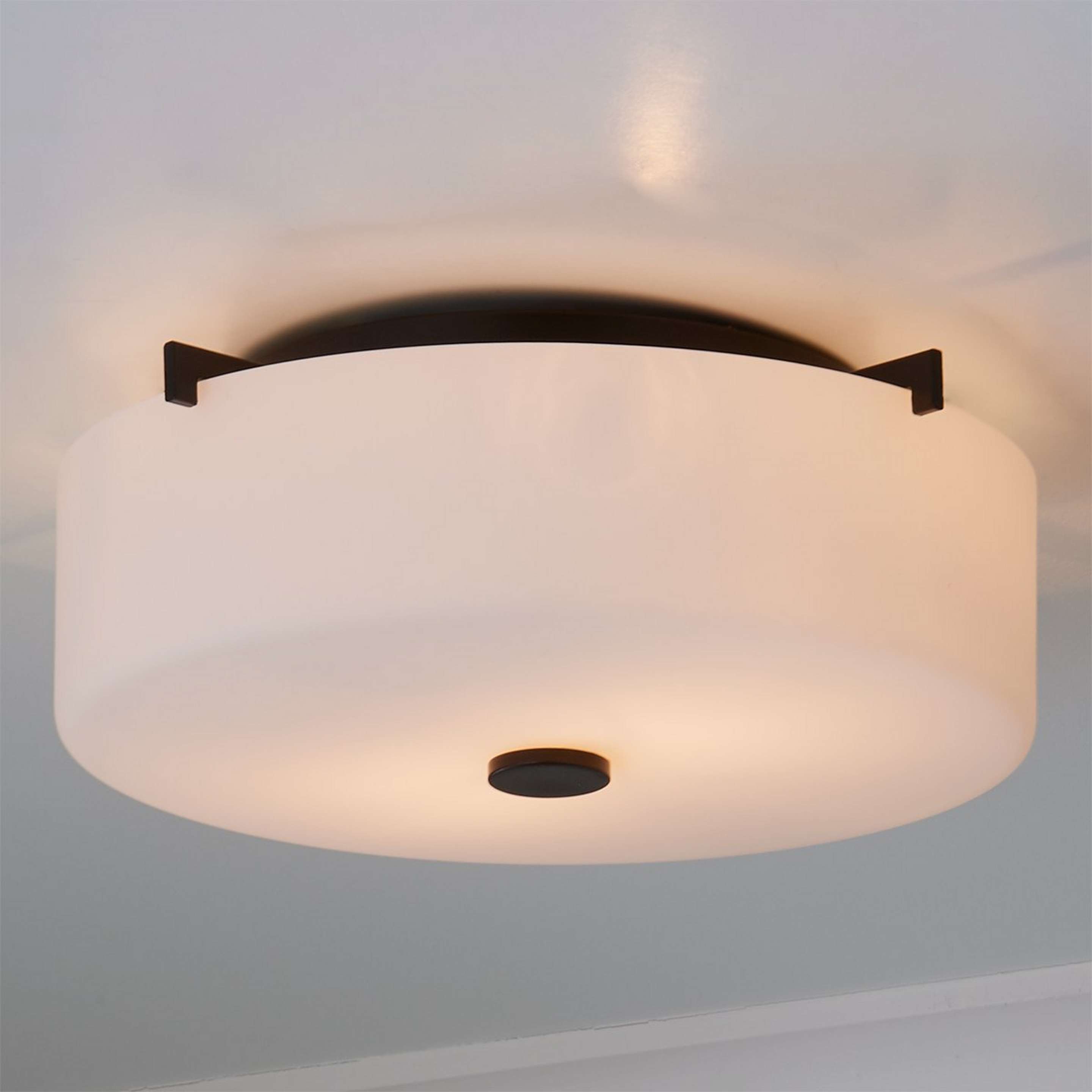 A White Glass Drum Ceiling Light with Oil Rubbed Bronze color