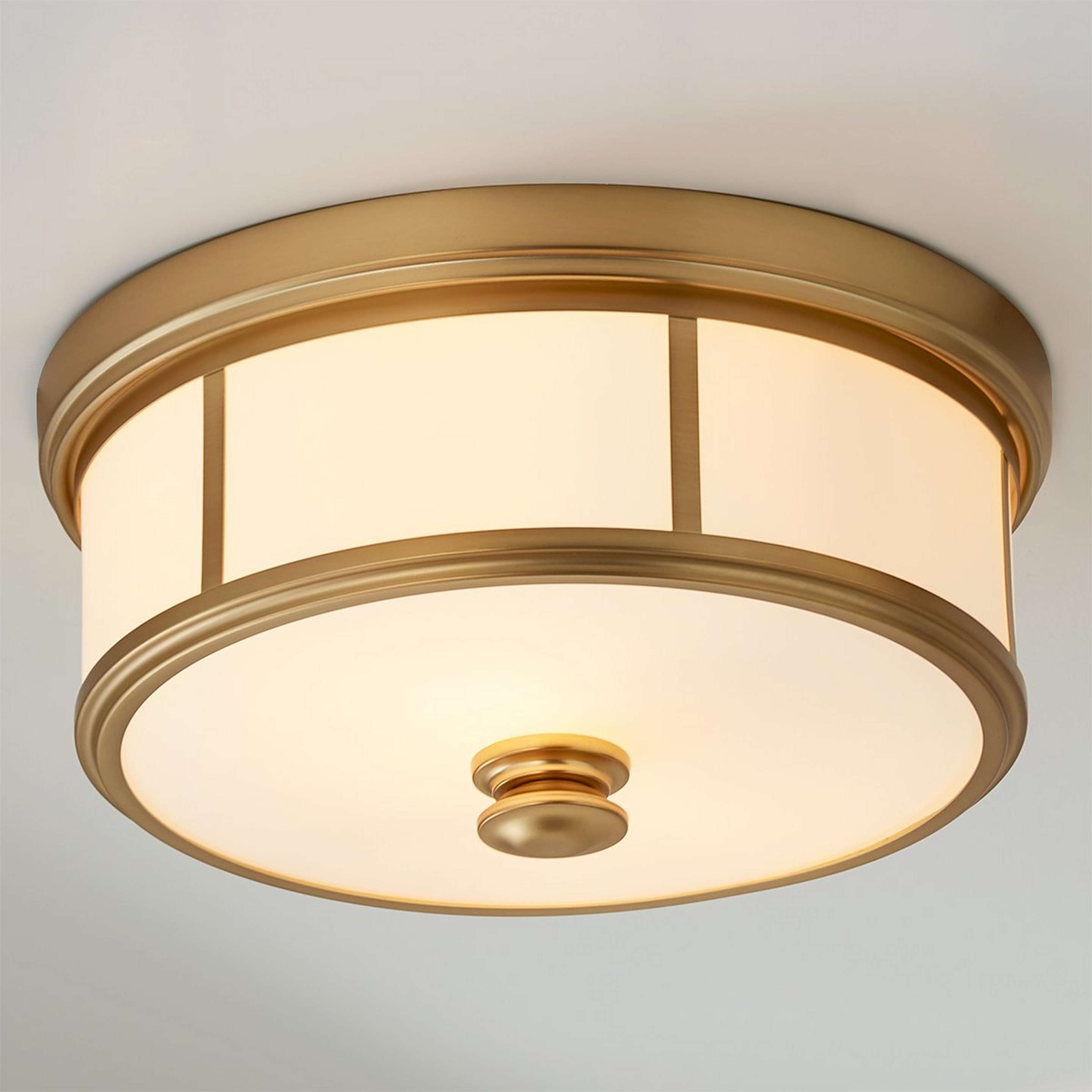 A Traditional Urban Cage Ceiling Light with Antique Gold / White Glass color