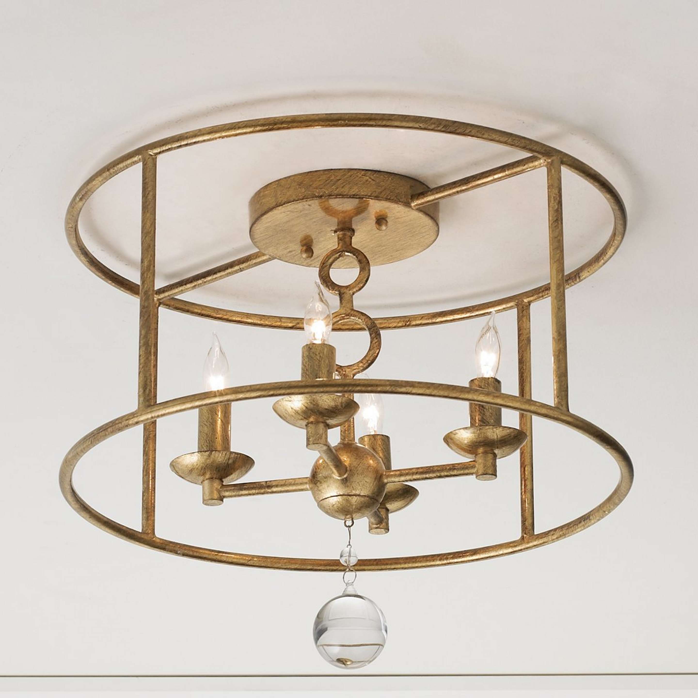 A Modern Cage Ceiling Light with Antiqued Gold color