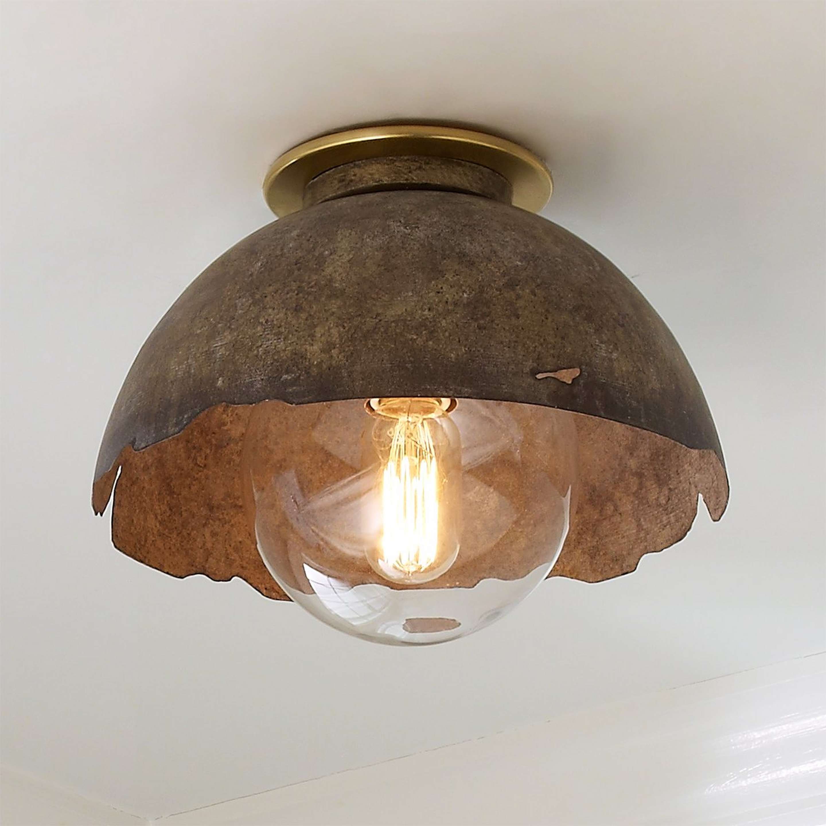 A Young House Love Rough Edge Metal Ceiling Light with Brass / Aged Bronze / Gunmetal color