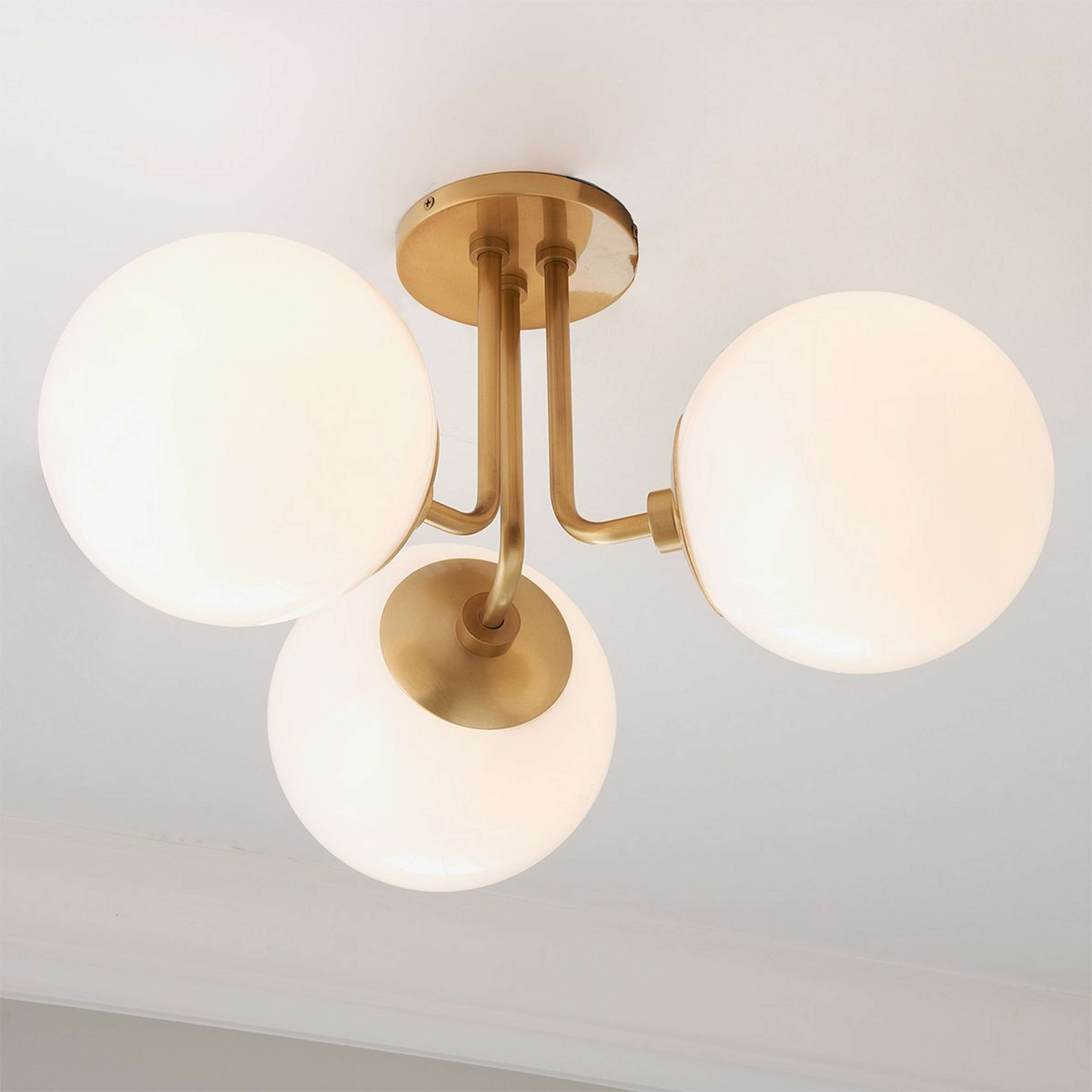 A Minimalist Globe Semi-Flush Ceiling Light - 3 Light with Satin Brass / White Glass color