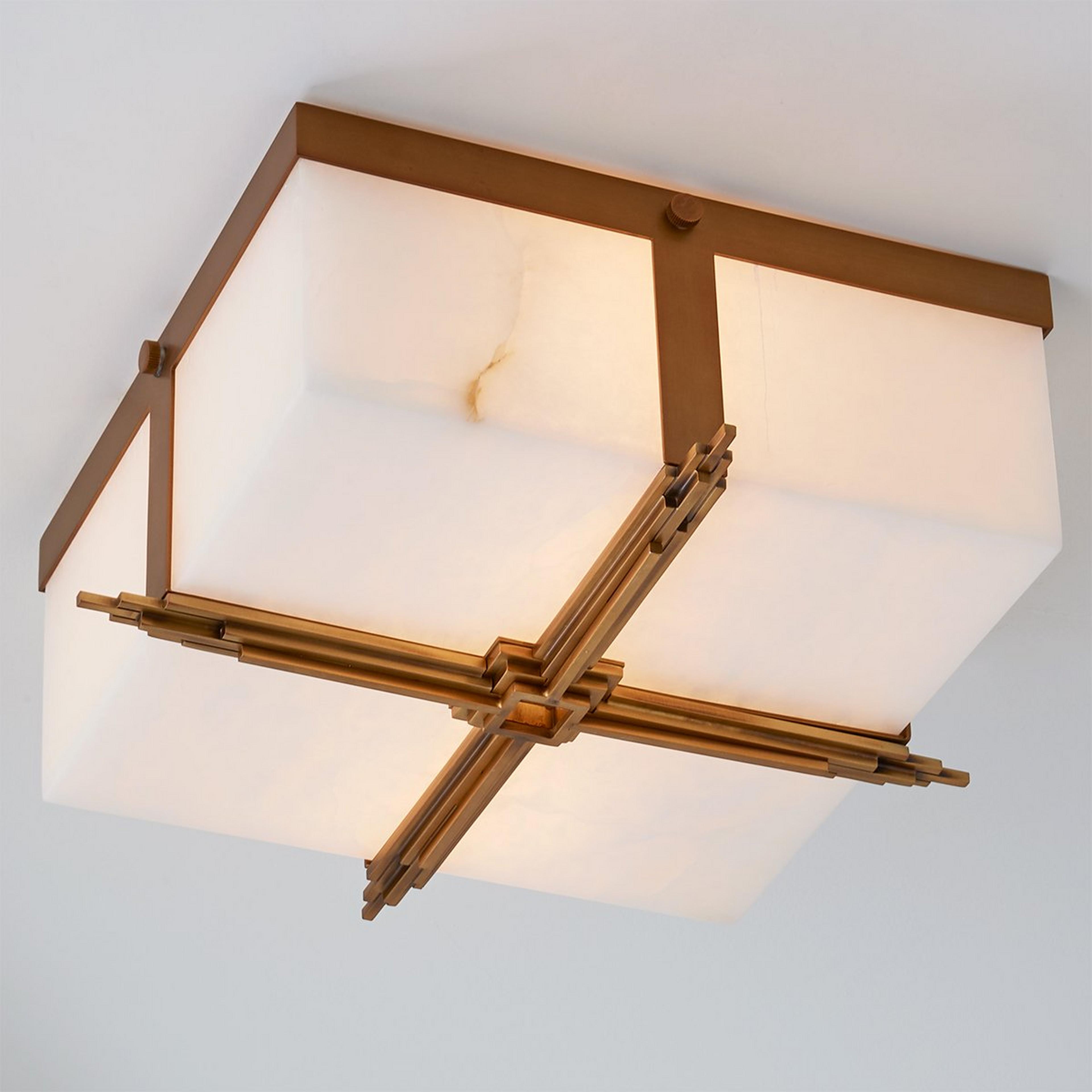 A Crossed Art Deco Ceiling Light with Natural Brass color