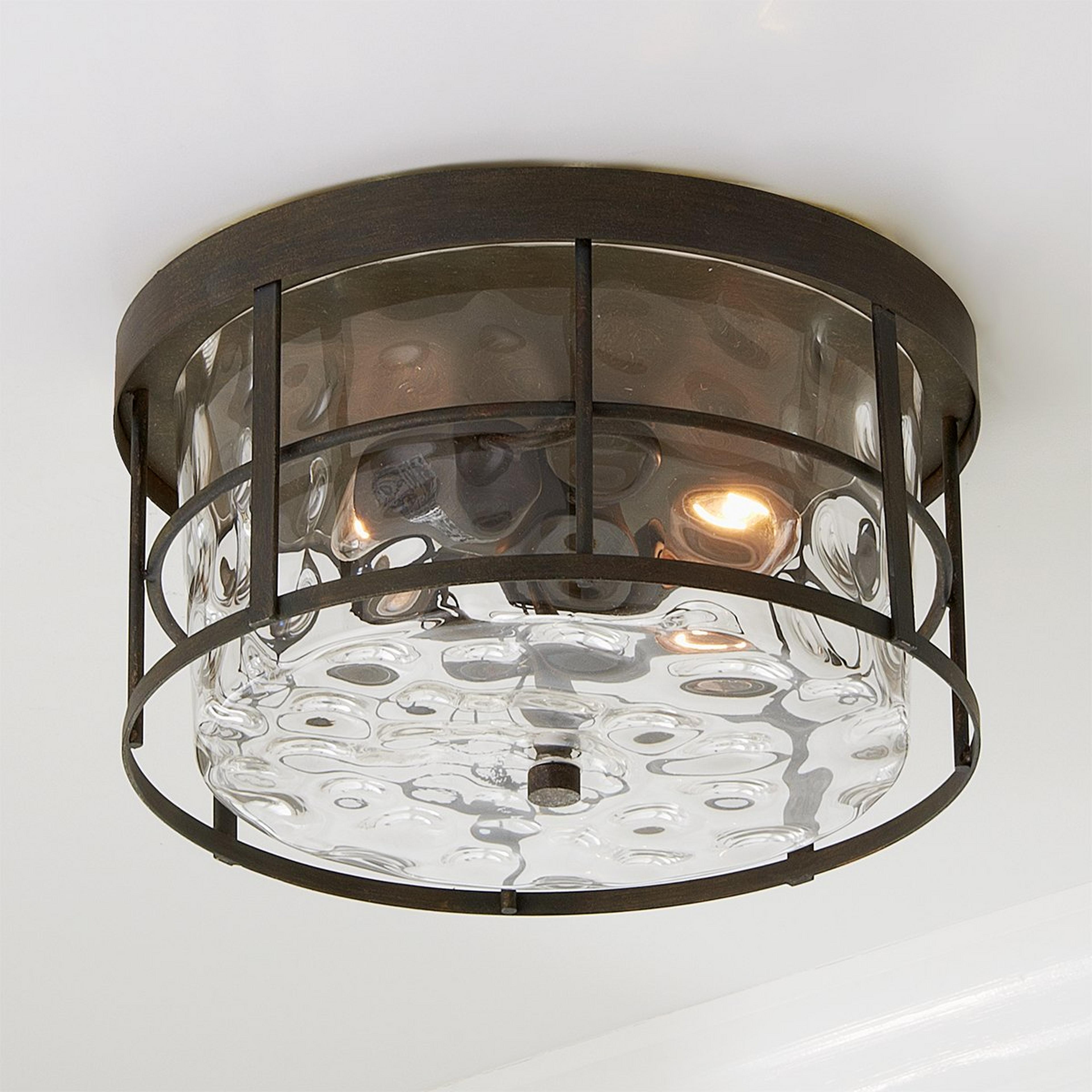 A Coastal Cottage Ceiling Light with Distressed Warm Bronze color