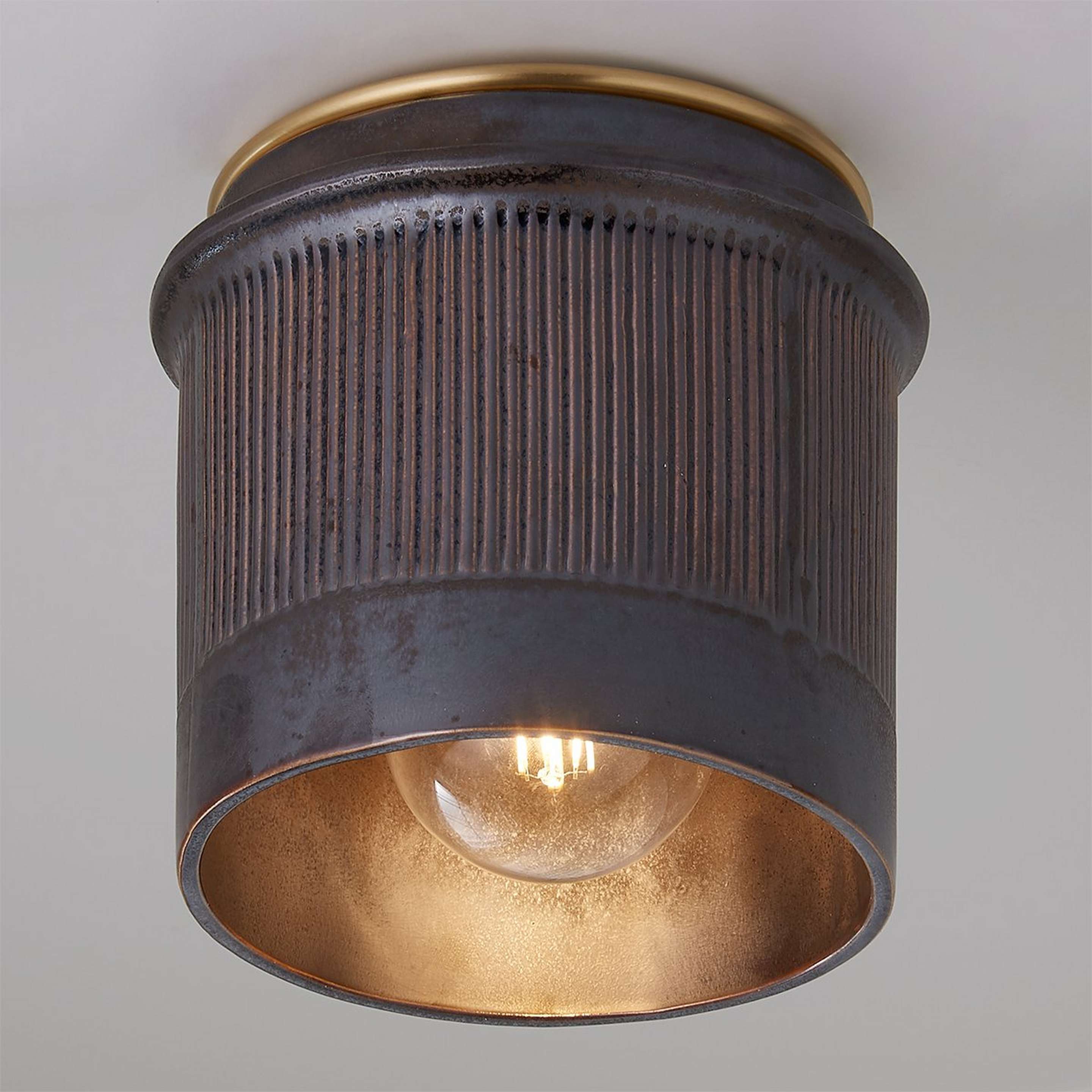 A Brito Ceiling Light with Brass / Torched Black color