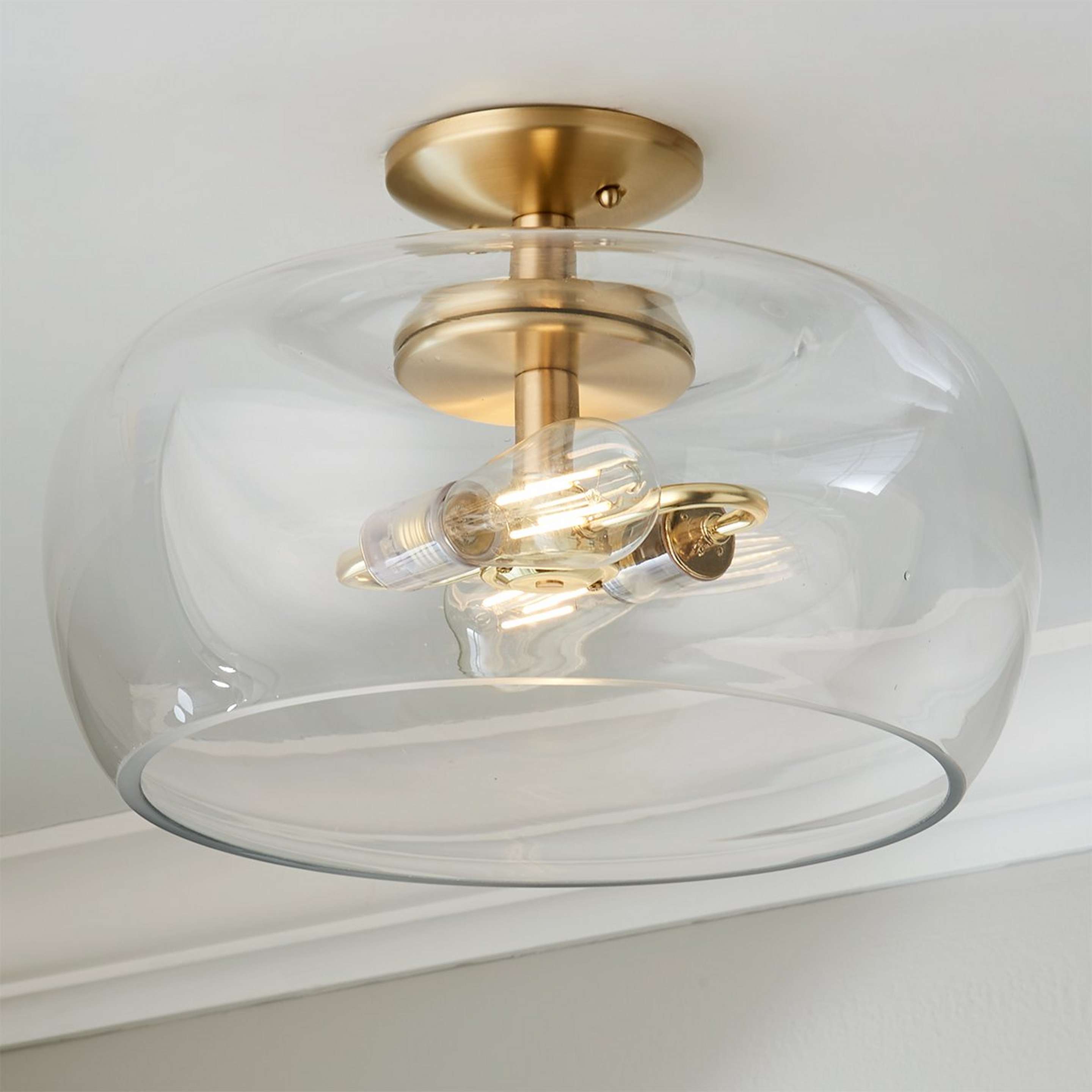 A Clearly Cool Semi-Flush Ceiling Light with Brass / Clear color