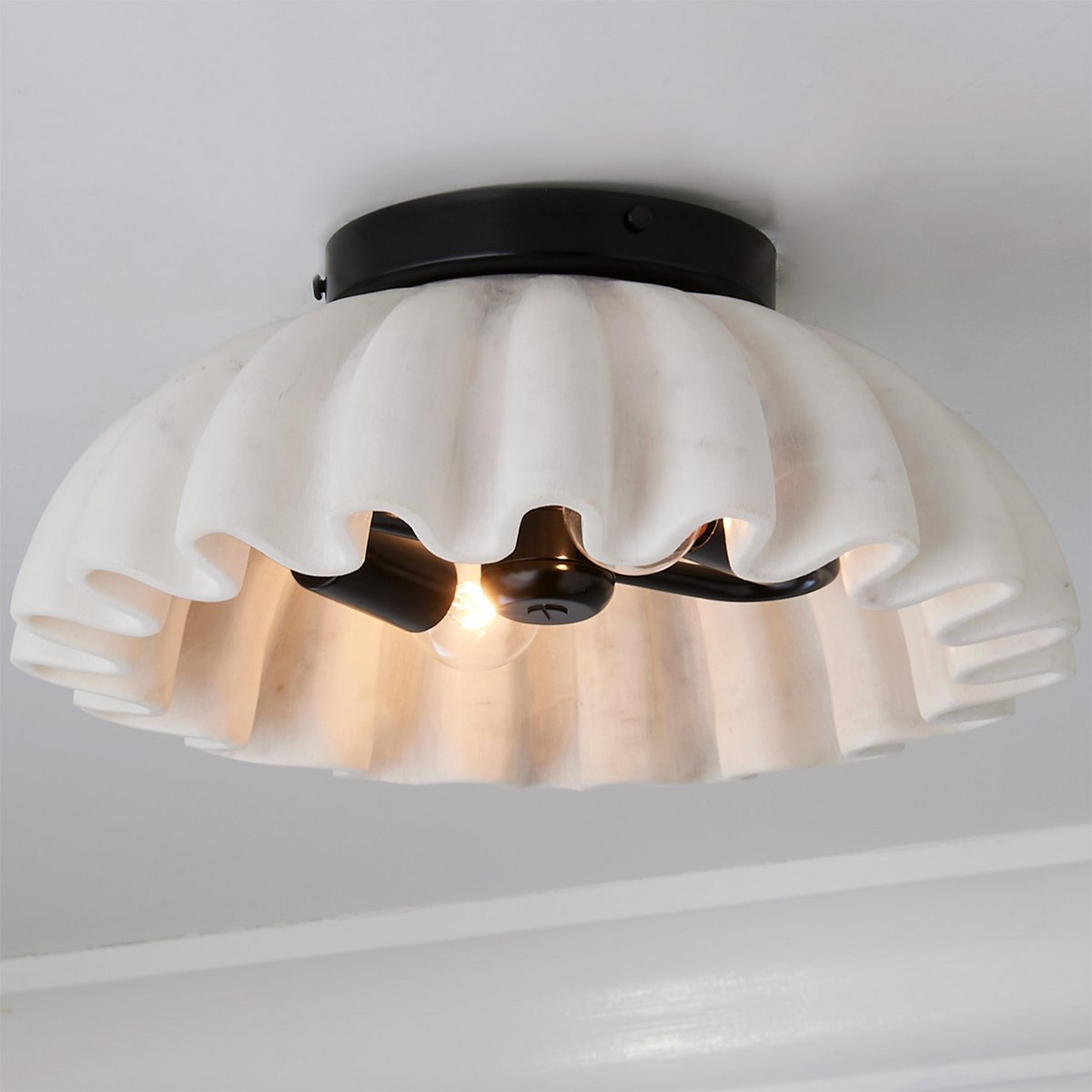 A Carved Marble Ruffle Ceiling Light with Black / White Marble color