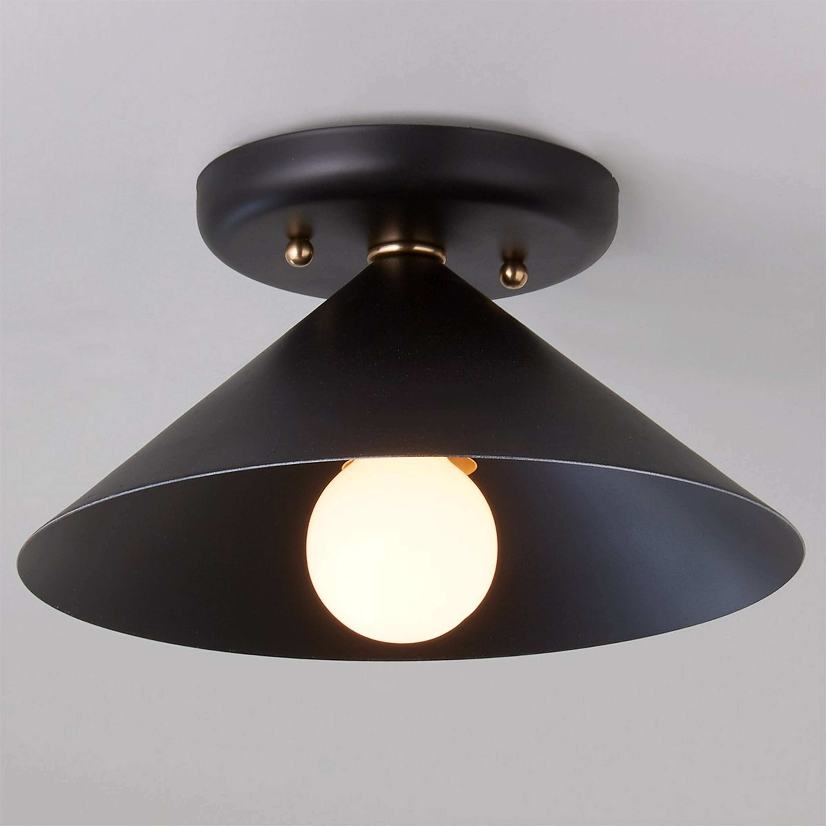 A Young House Love Cone Pop Ceiling Light with Black / Solid Brass color