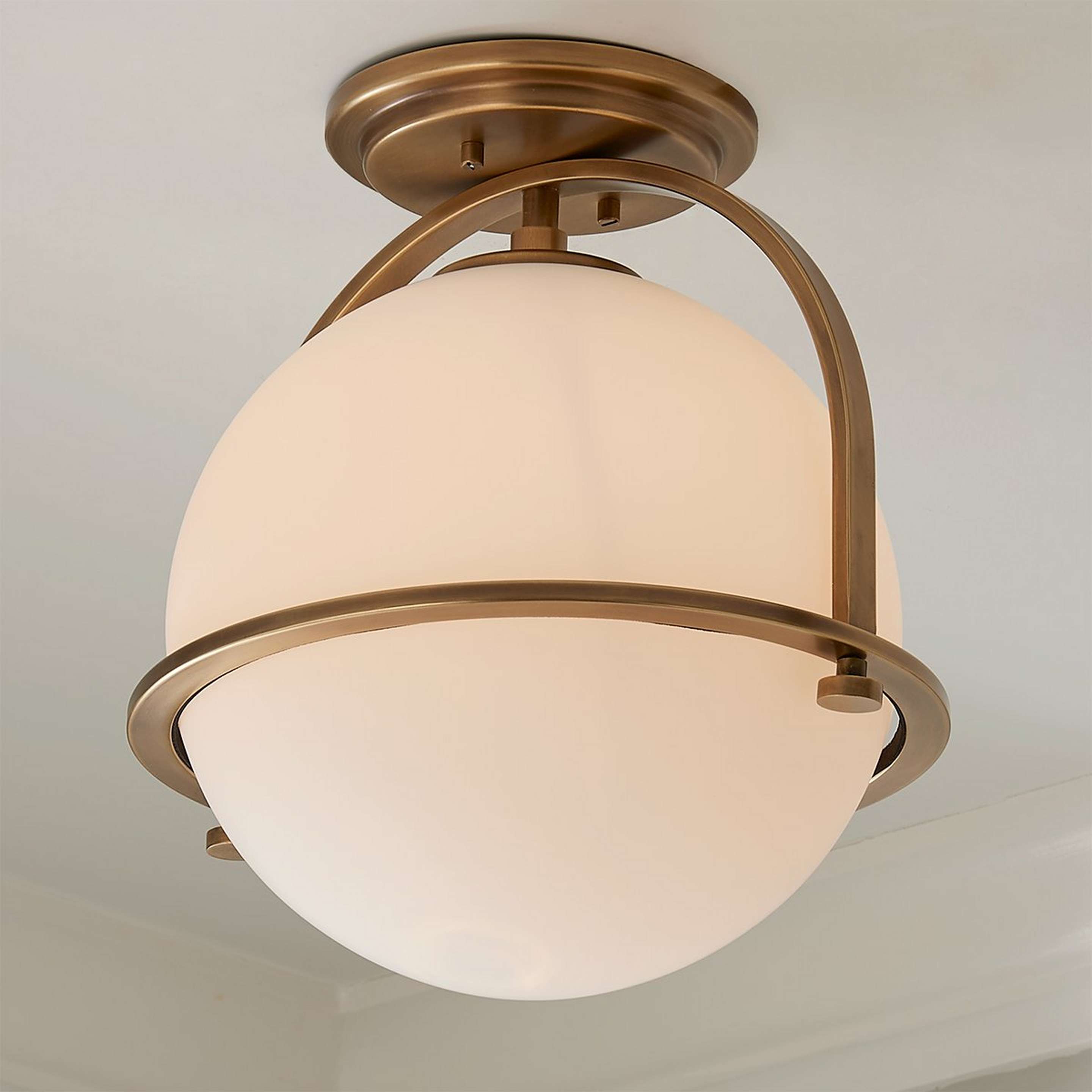 A Apogee Ceiling Light with Antique Brass / Opal Glass color