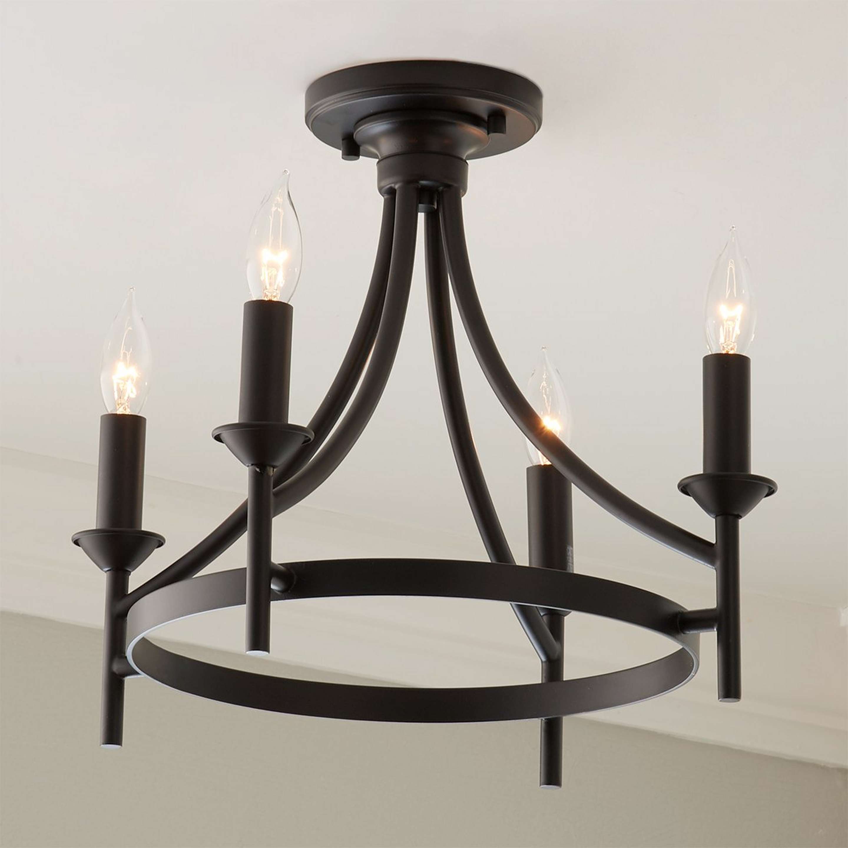 A Sabrina Convertible Ceiling Light with Matte Black color