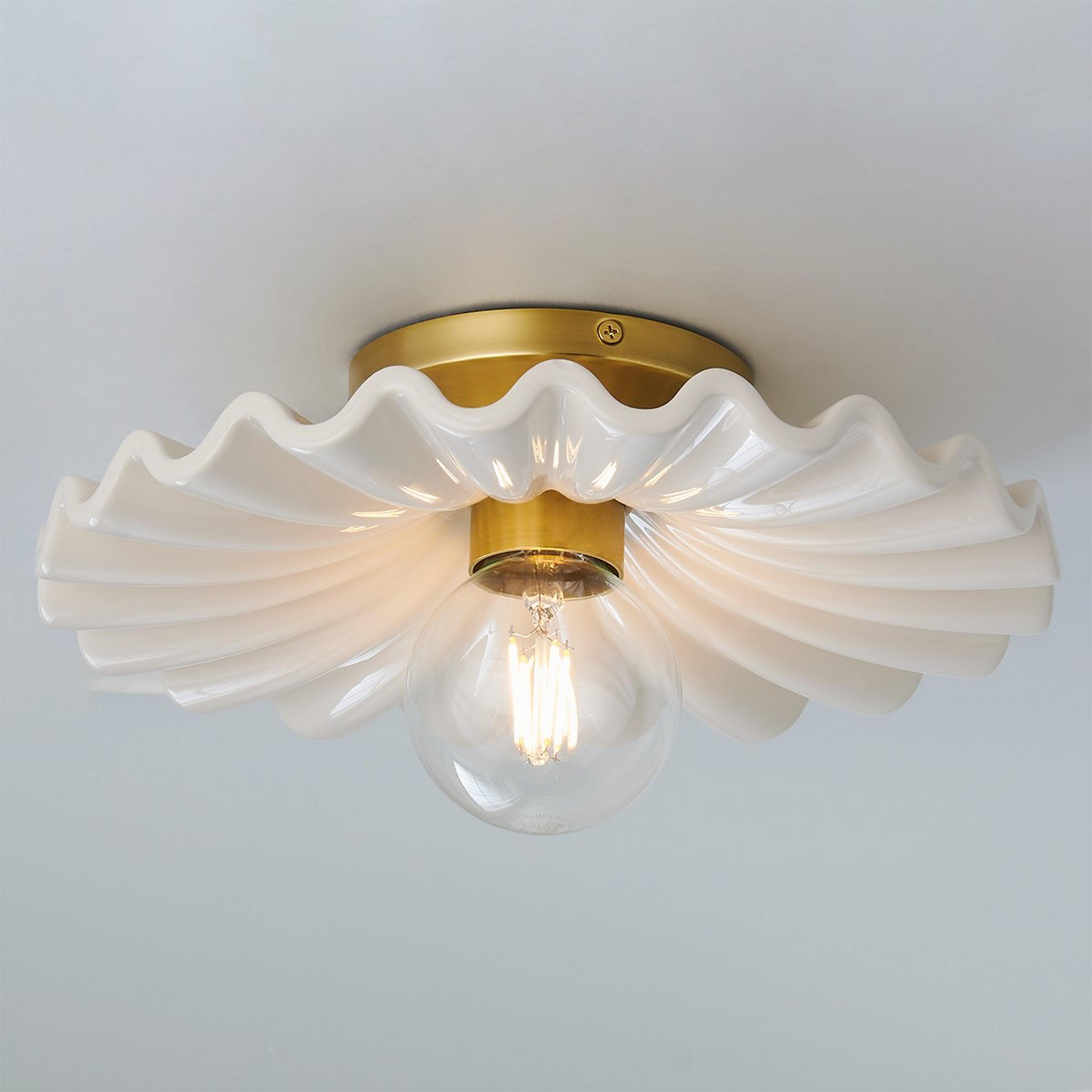 A Primula Ceiling Light with Aged Brass / Cream color