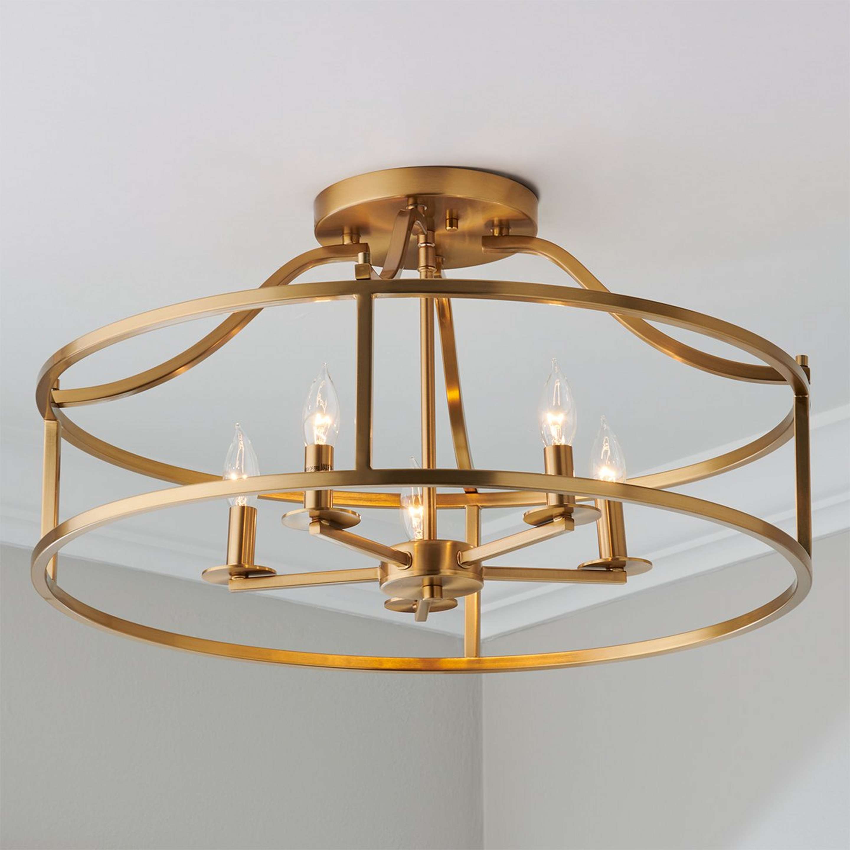 A Riella Ceiling Light with Warm Brass color