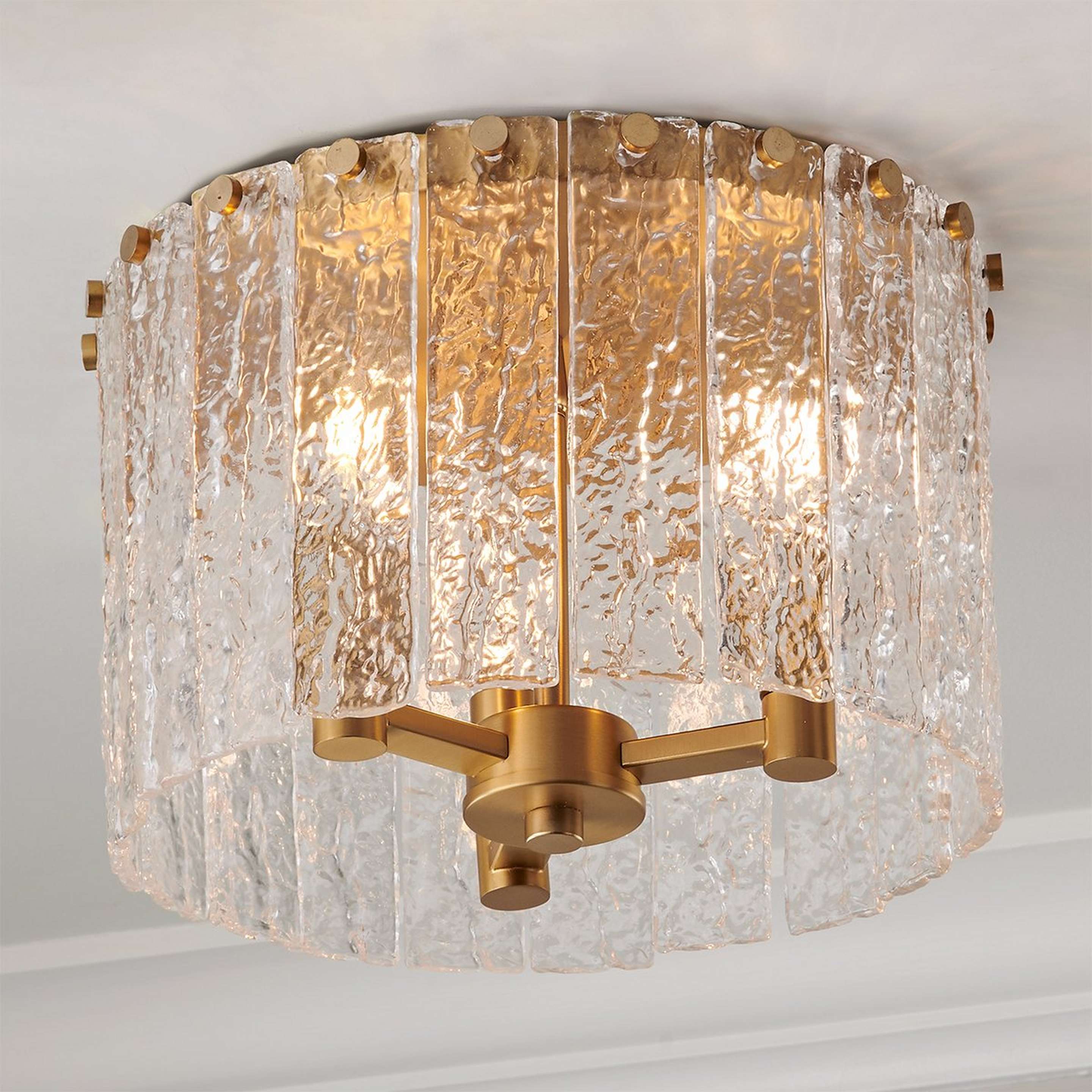 A Sonoraz Ceiling Light - Small with Gold / Clear Textured Glass color