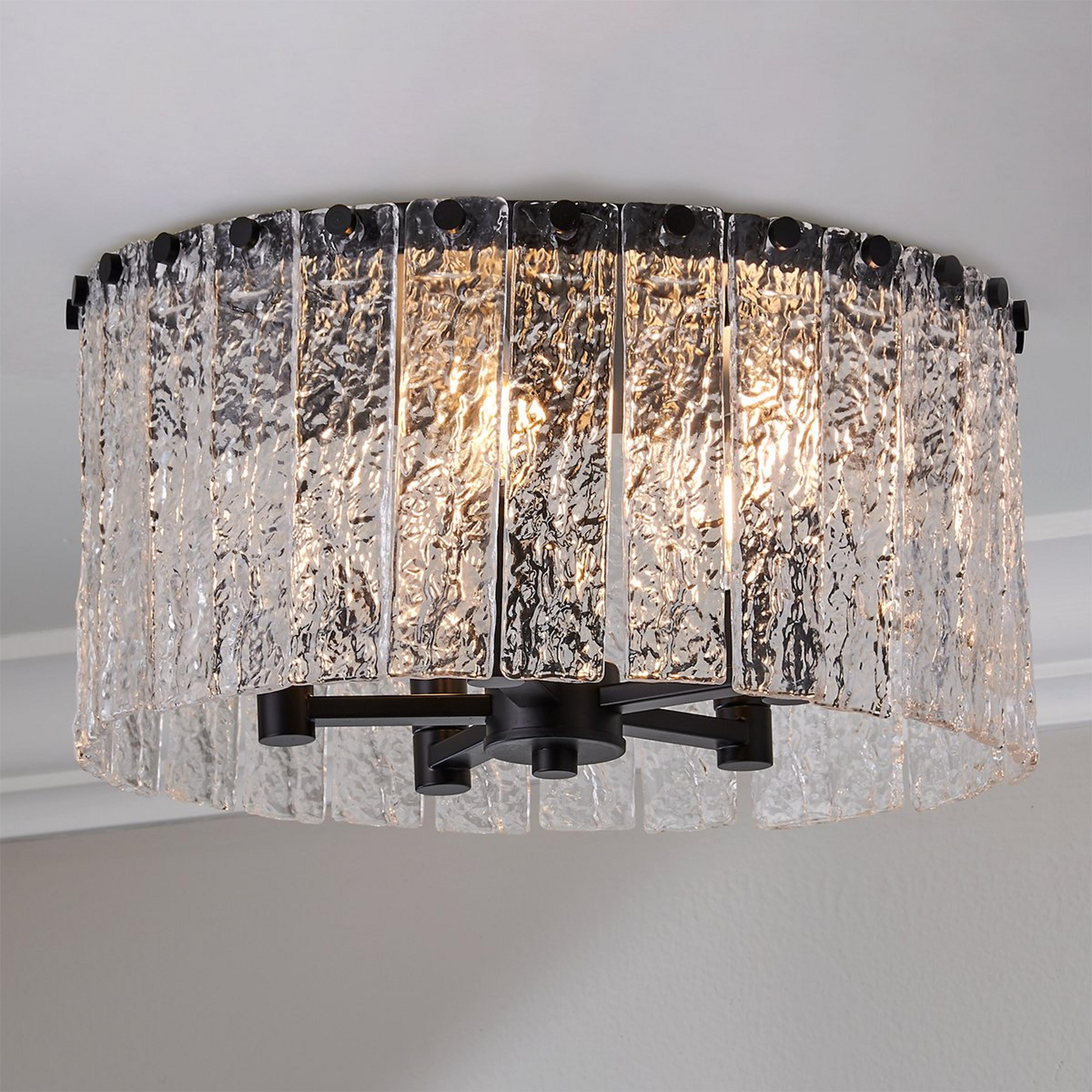 A Sonoraz Ceiling Light - Medium with Matte Black / Clear Textured Glass color