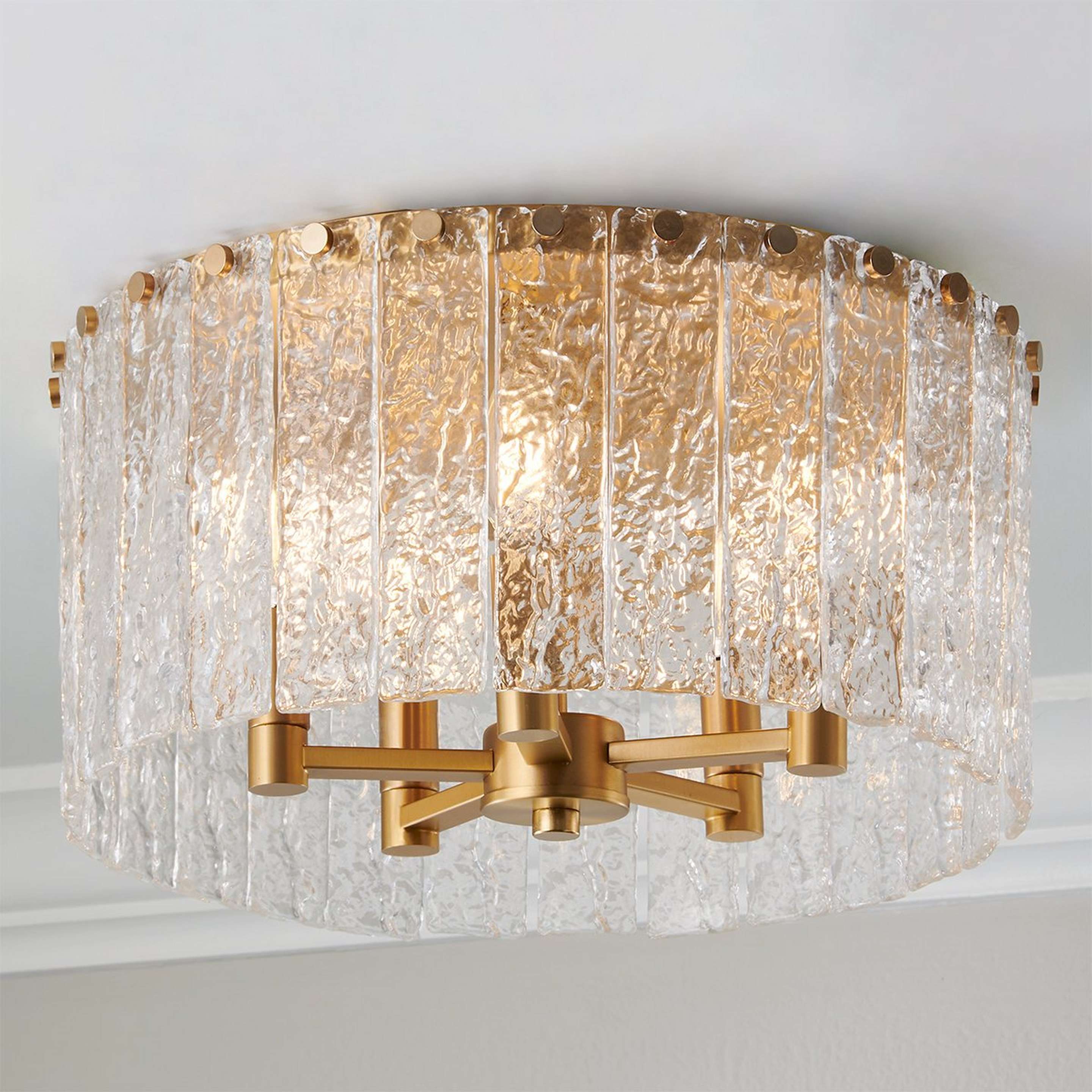 A Sonoraz Ceiling Light - Medium with Gold / Clear Textured Glass color