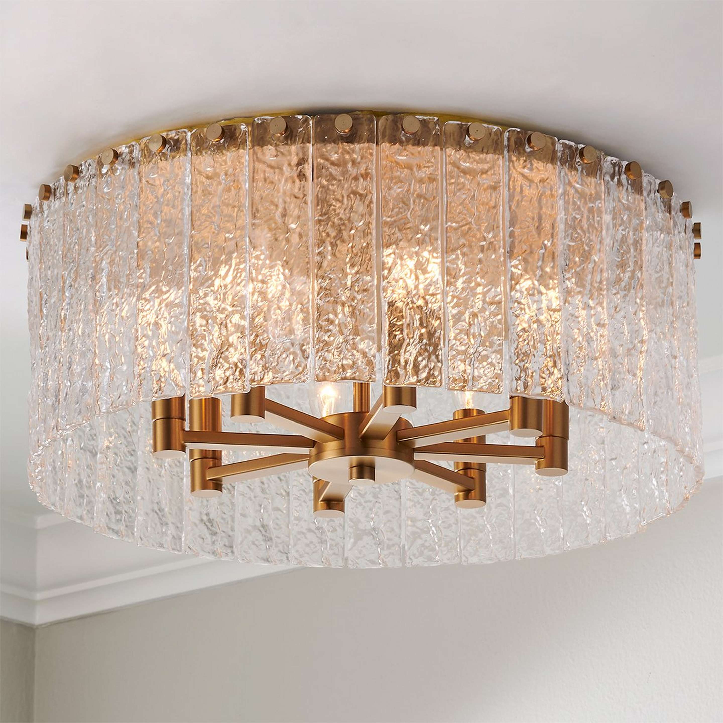 A Sonoraz Ceiling Light - Large with Gold / Clear Textured Glass color