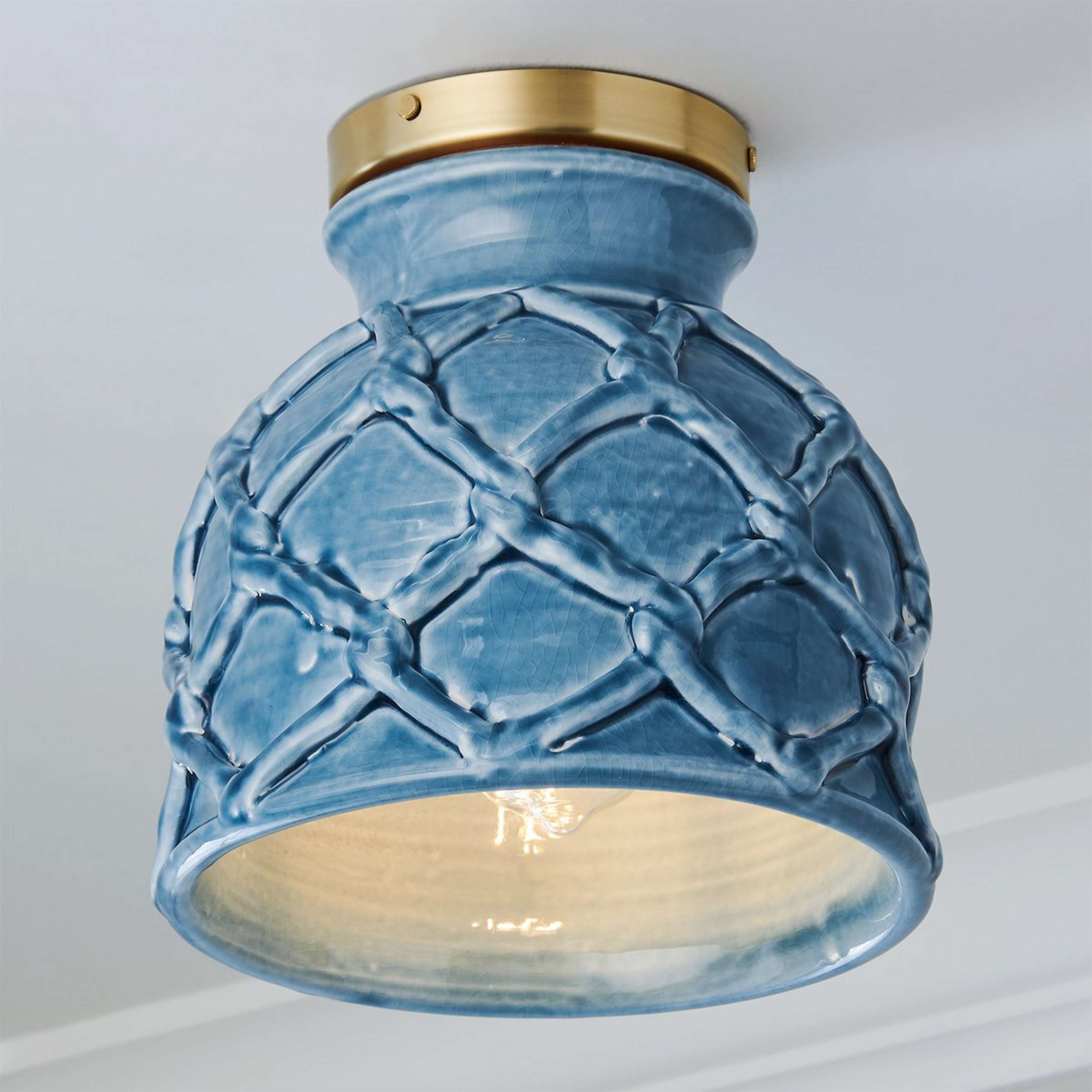 A Lattuga Ceiling Light with Brushed Brass / Blue color