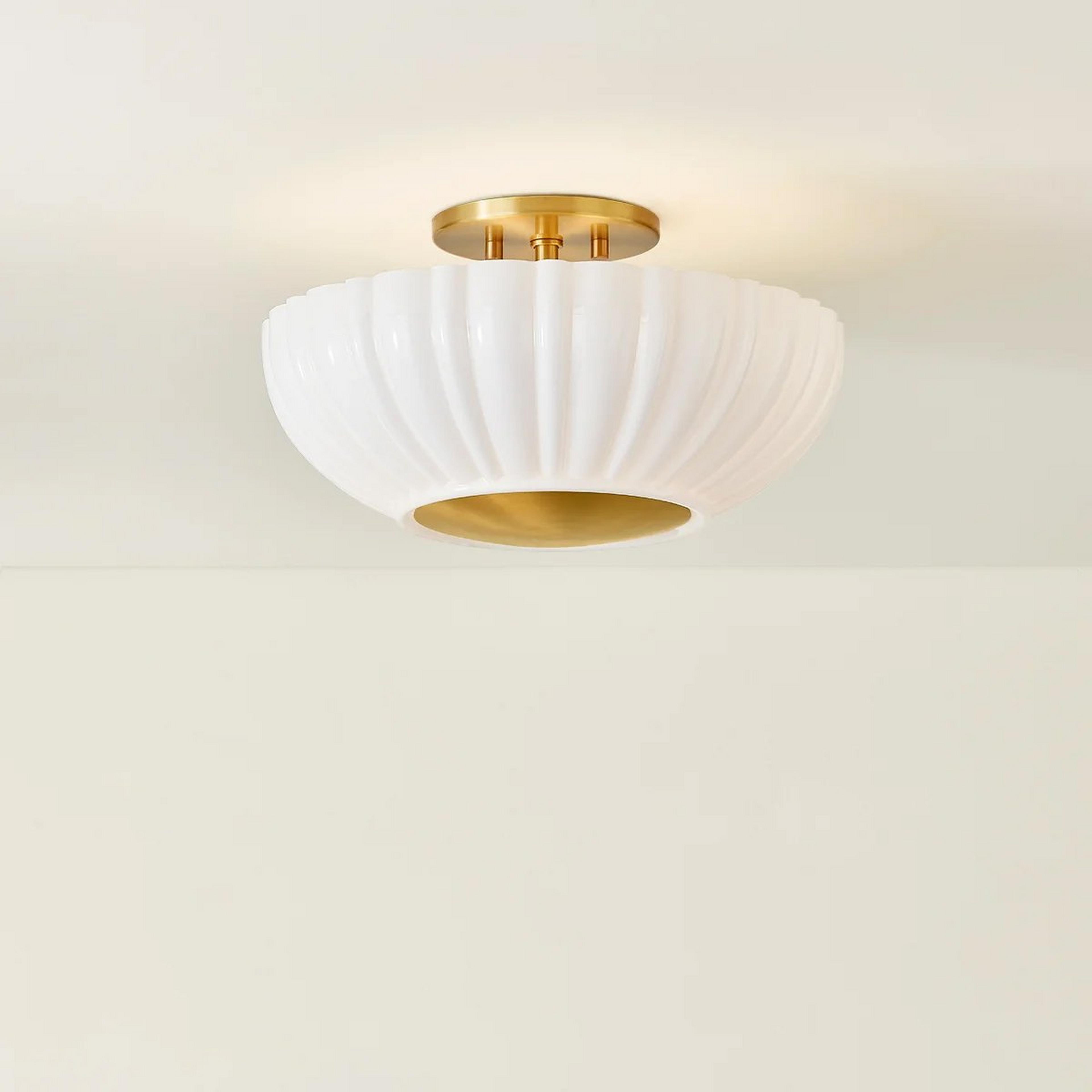 A Roberta Ceiling Light with Brass / White Glass color