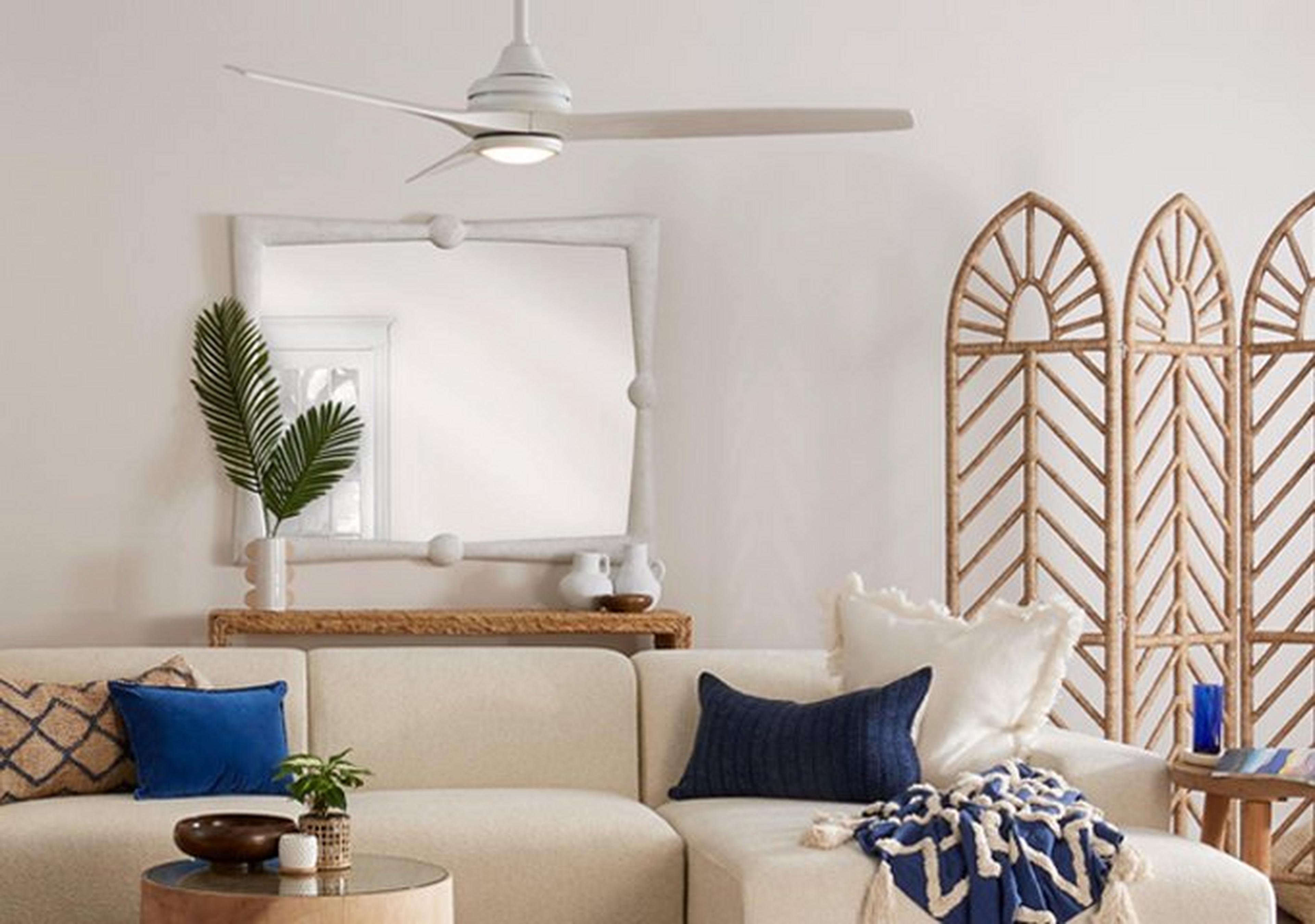 Wood and metal fan in coastal room