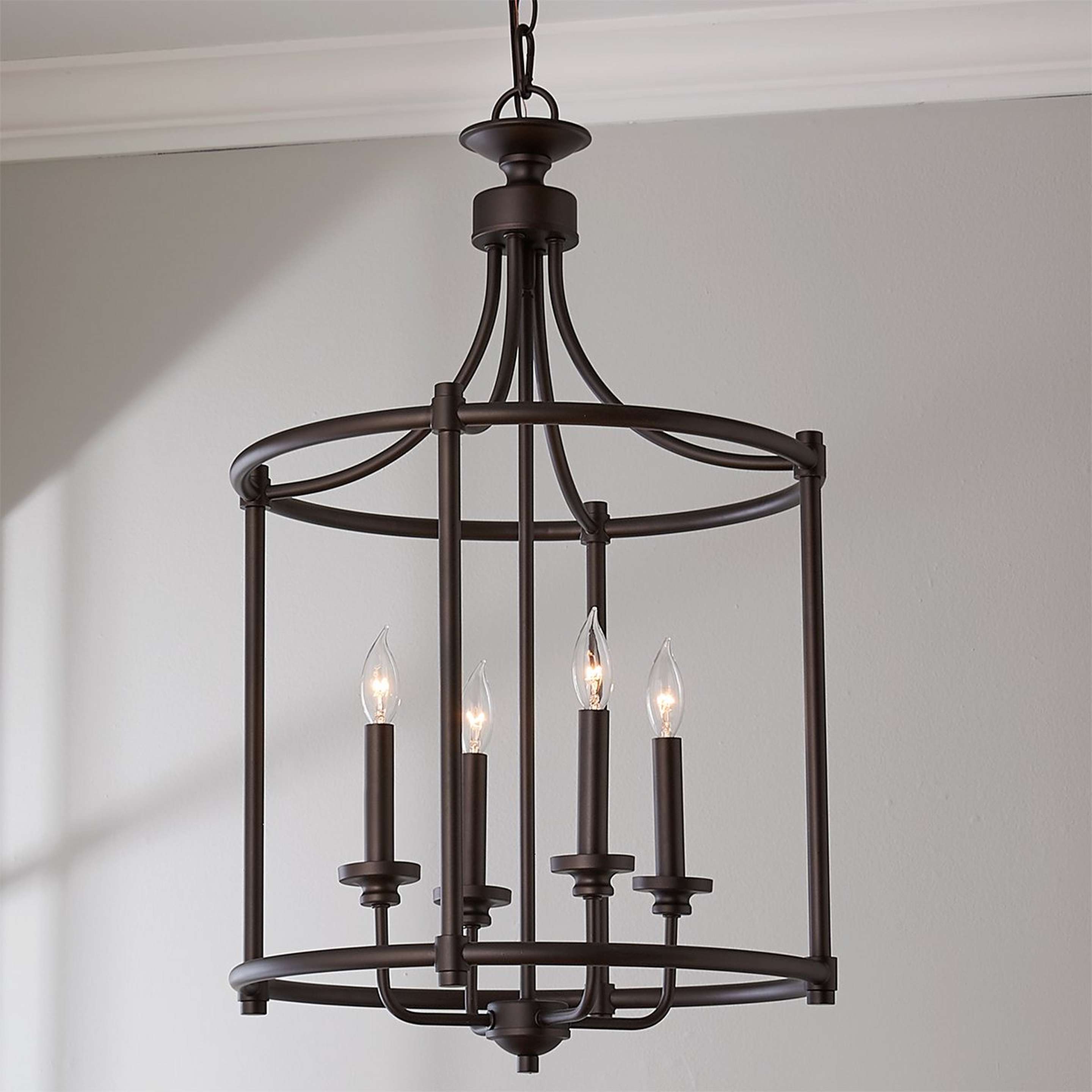 A Lustre en Transition Lantern with Oiled Bronze color