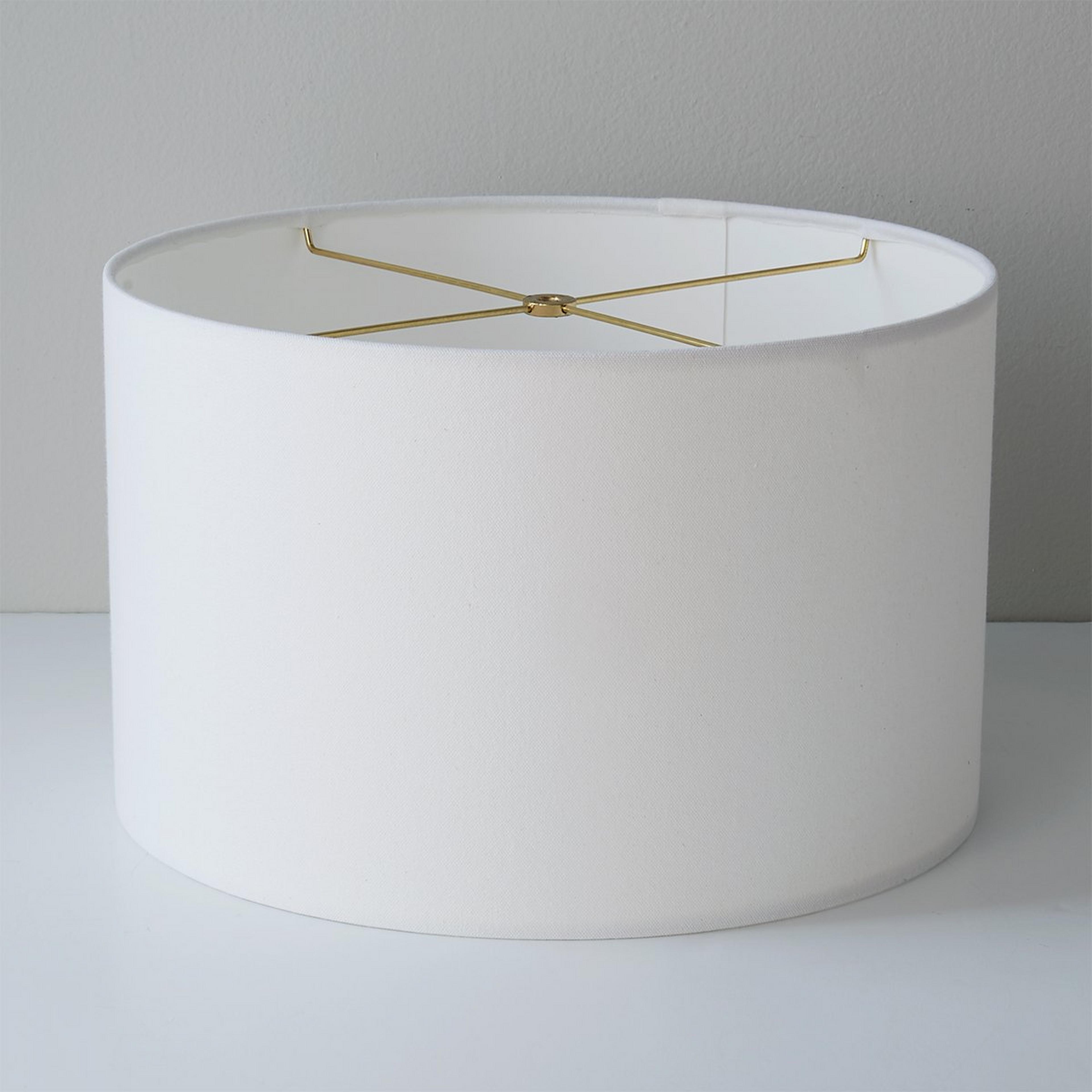A 16" Wide White Cotton Duck Drum Shade with White / Brass  color