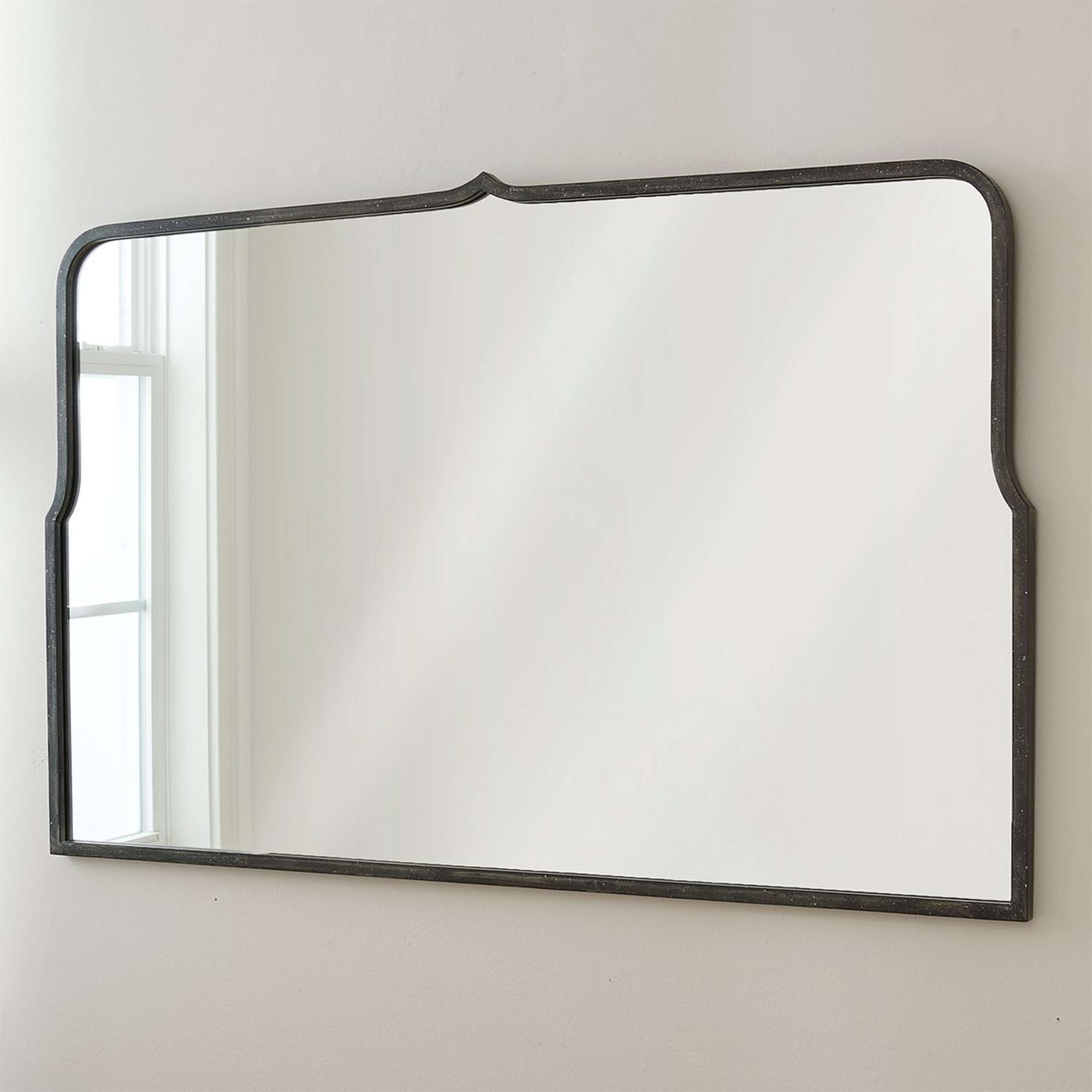 A Bernadette Mirror with Distressed Black color