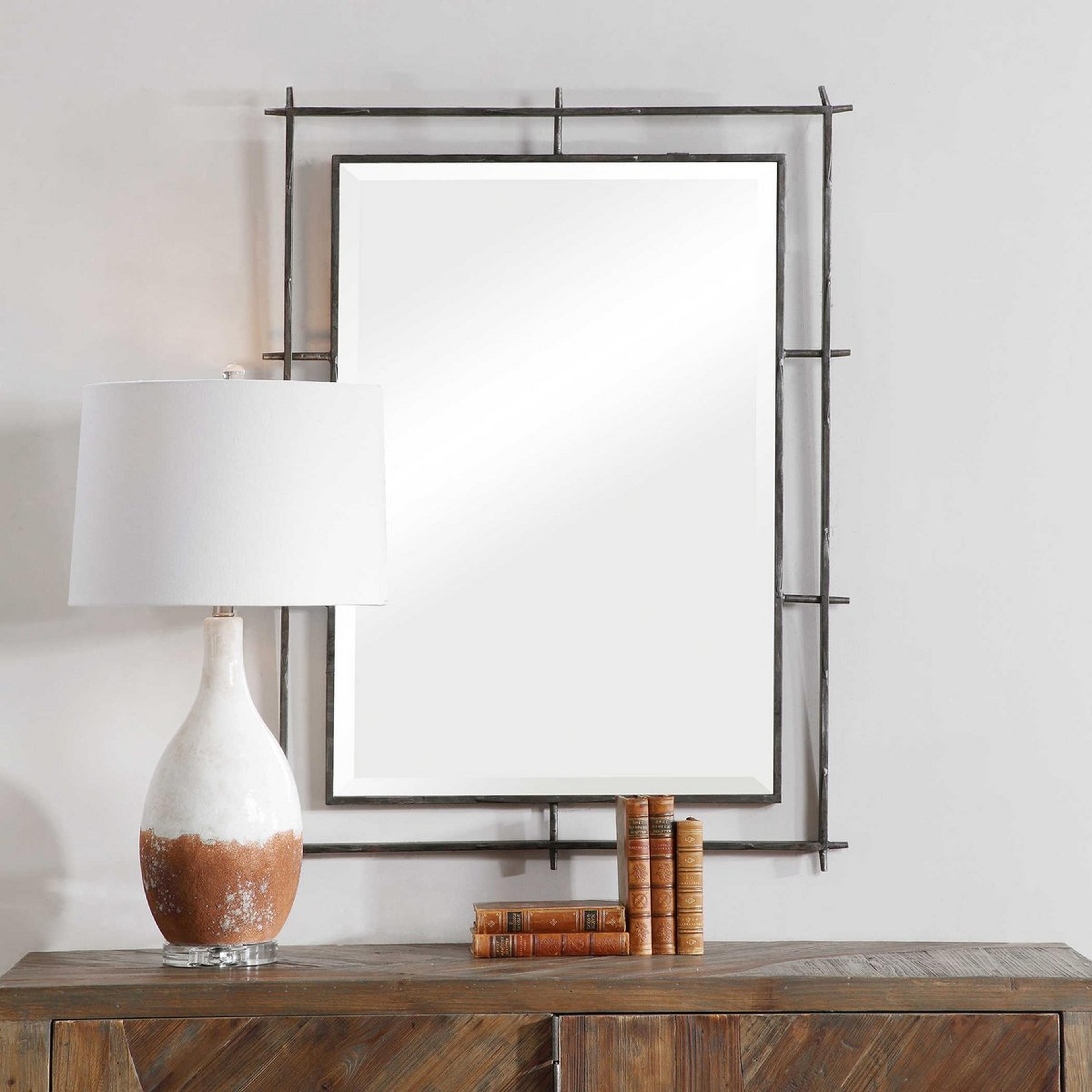 A Micah Mirror with Distressed Iron color