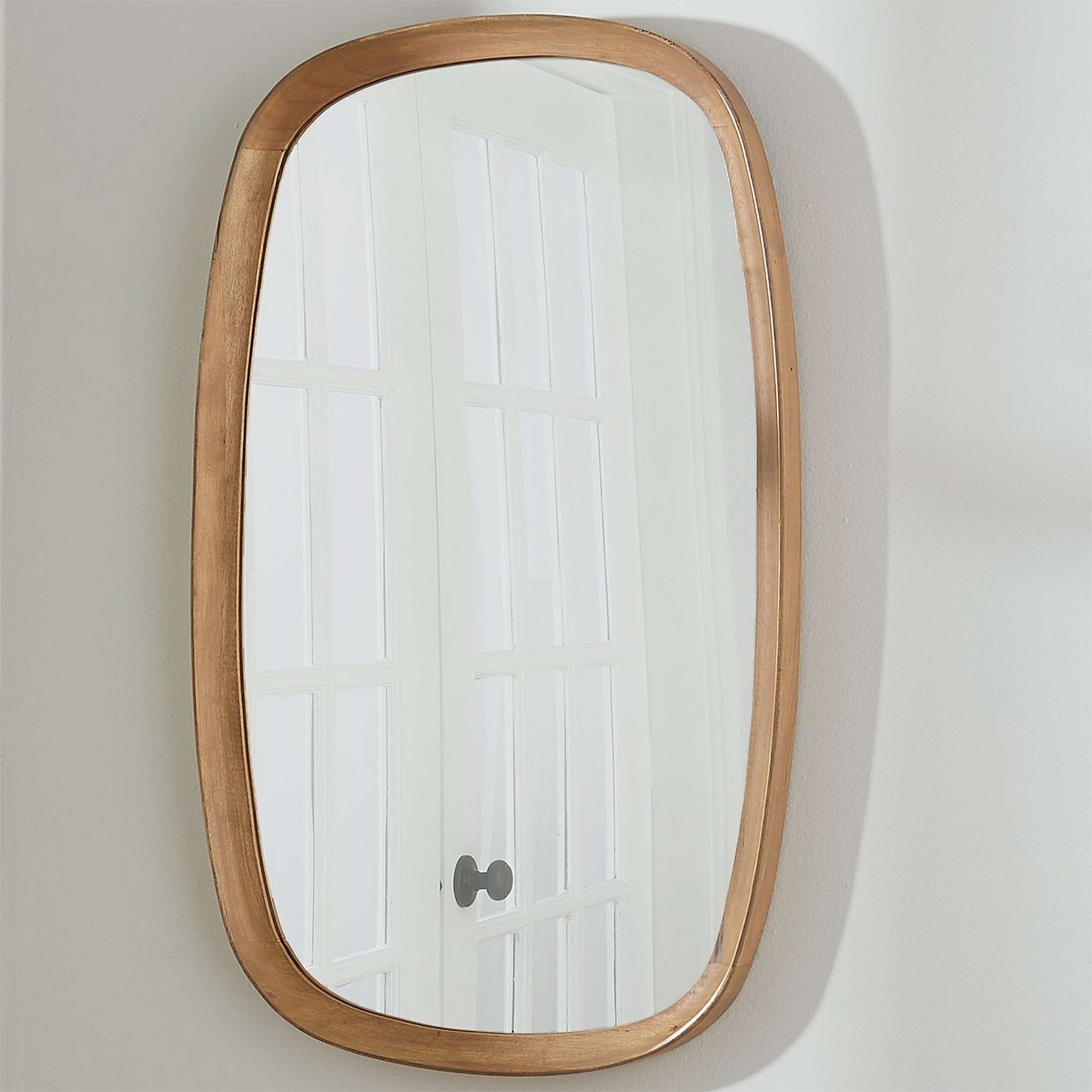 A Wrenfield Mirror with Light Wood color