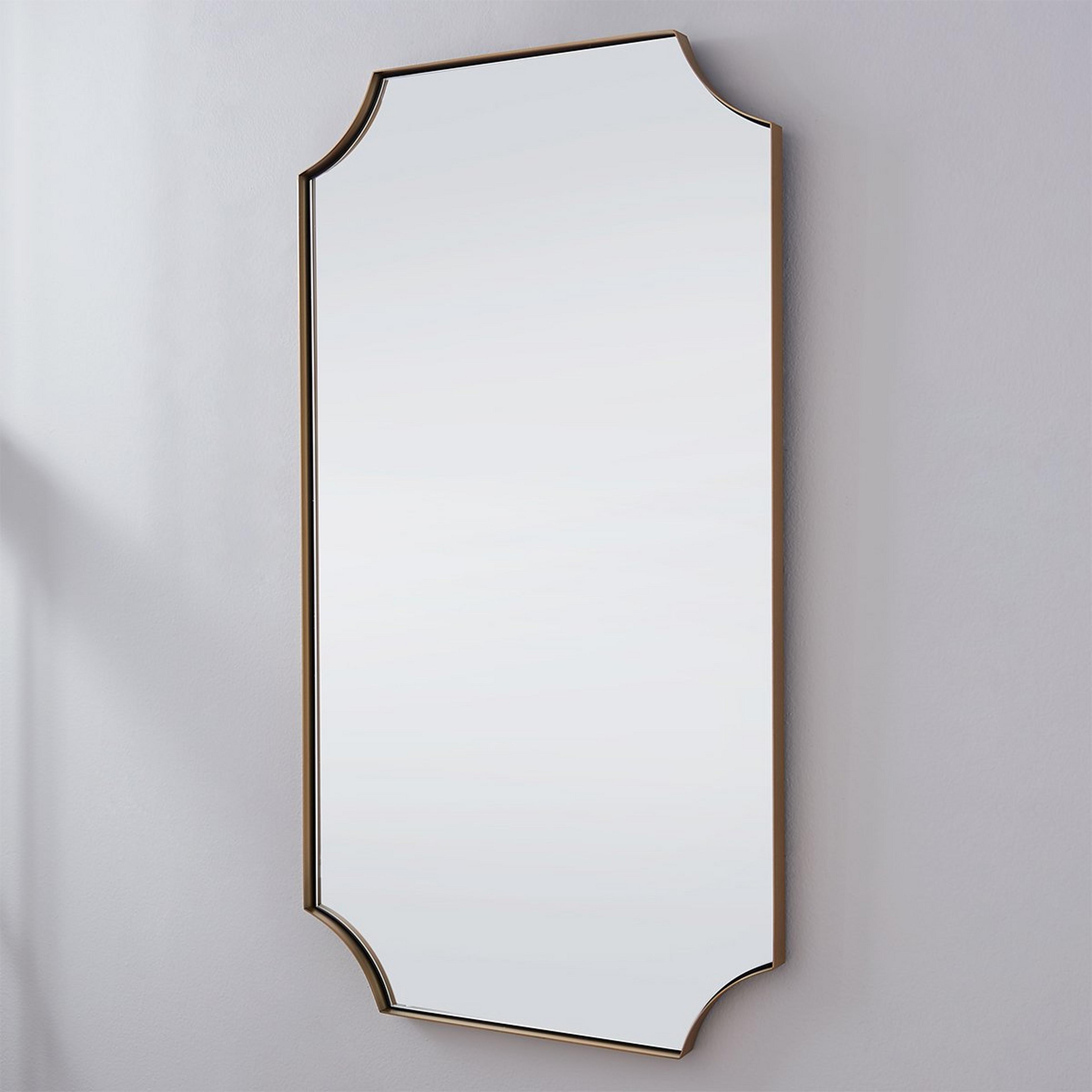 A Emanuelson Mirror with Brass color