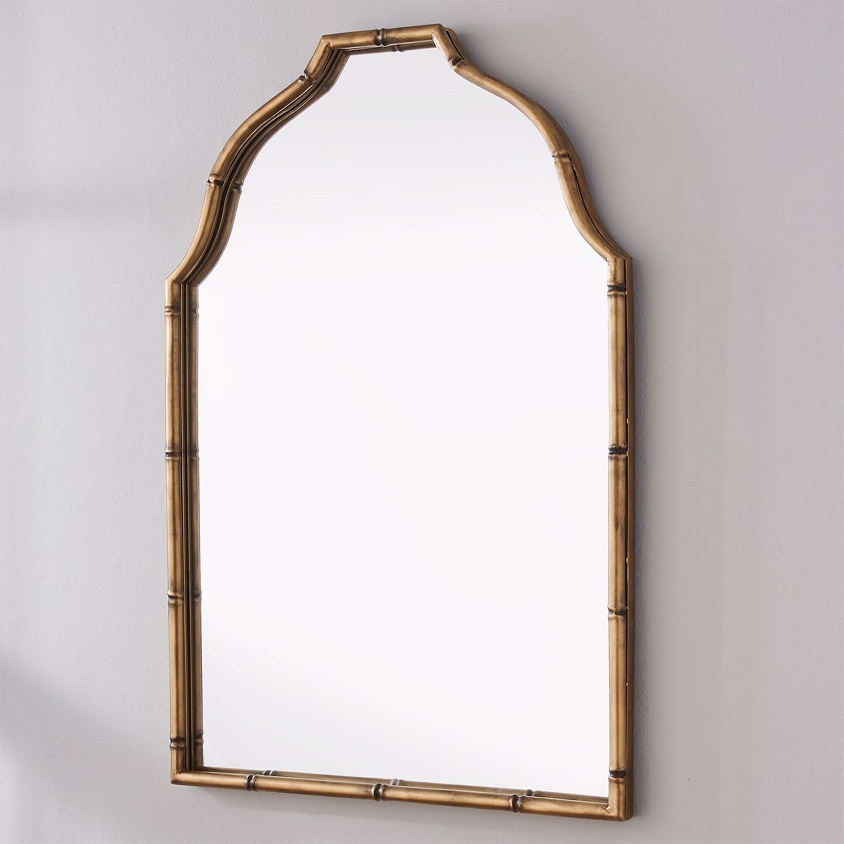 A Benabe Mirror with Gold color