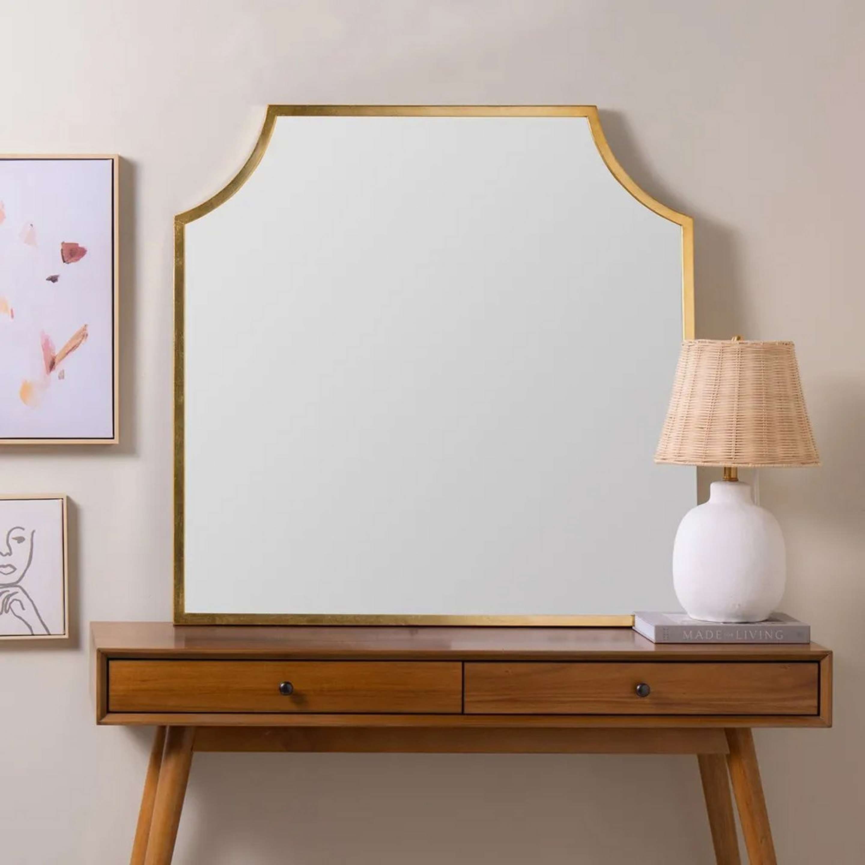 A Sylvayn Mantle Mirror with Gold color