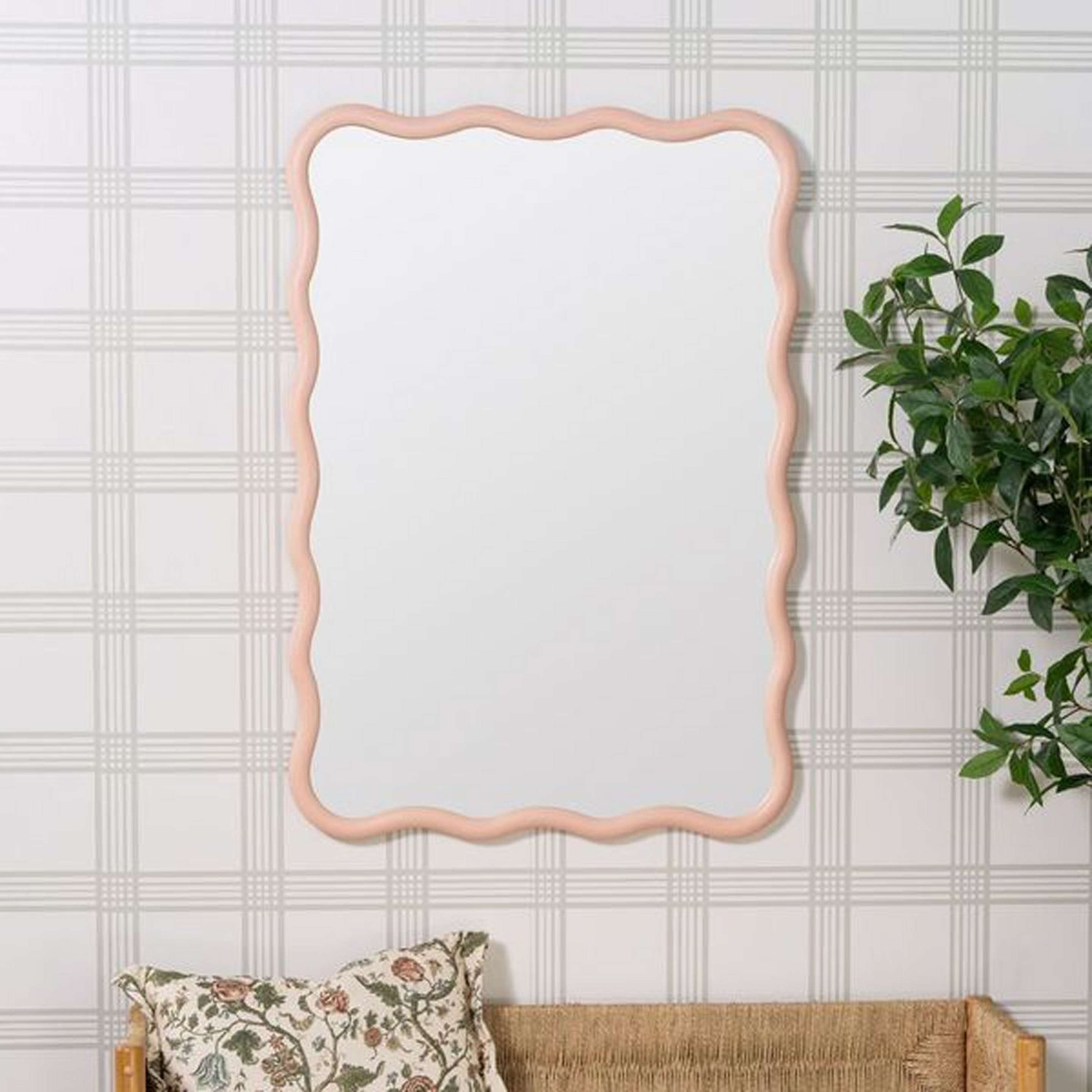 A Zawi Mirror with Rose Pink color