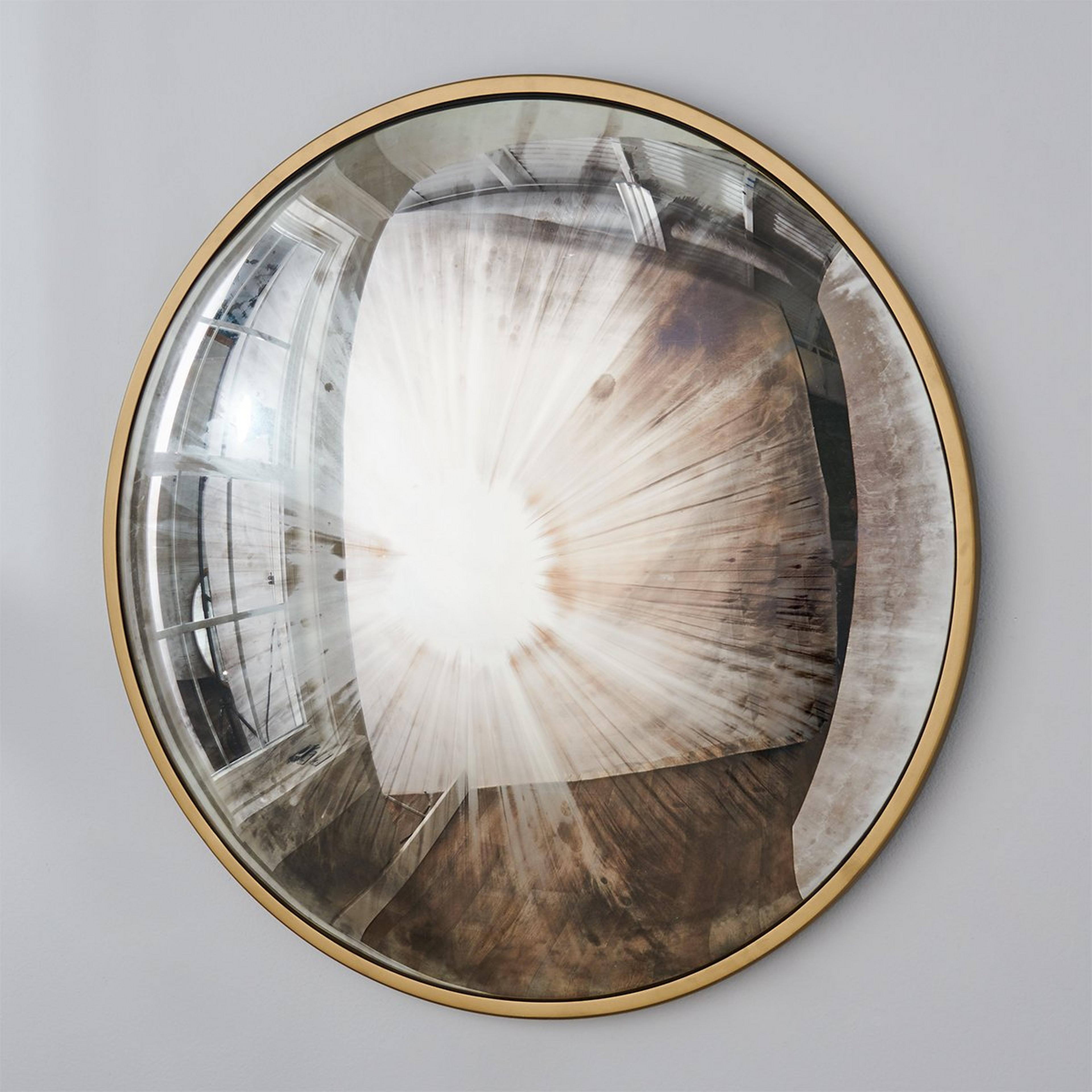 A Pehtra Mirror with Gold color