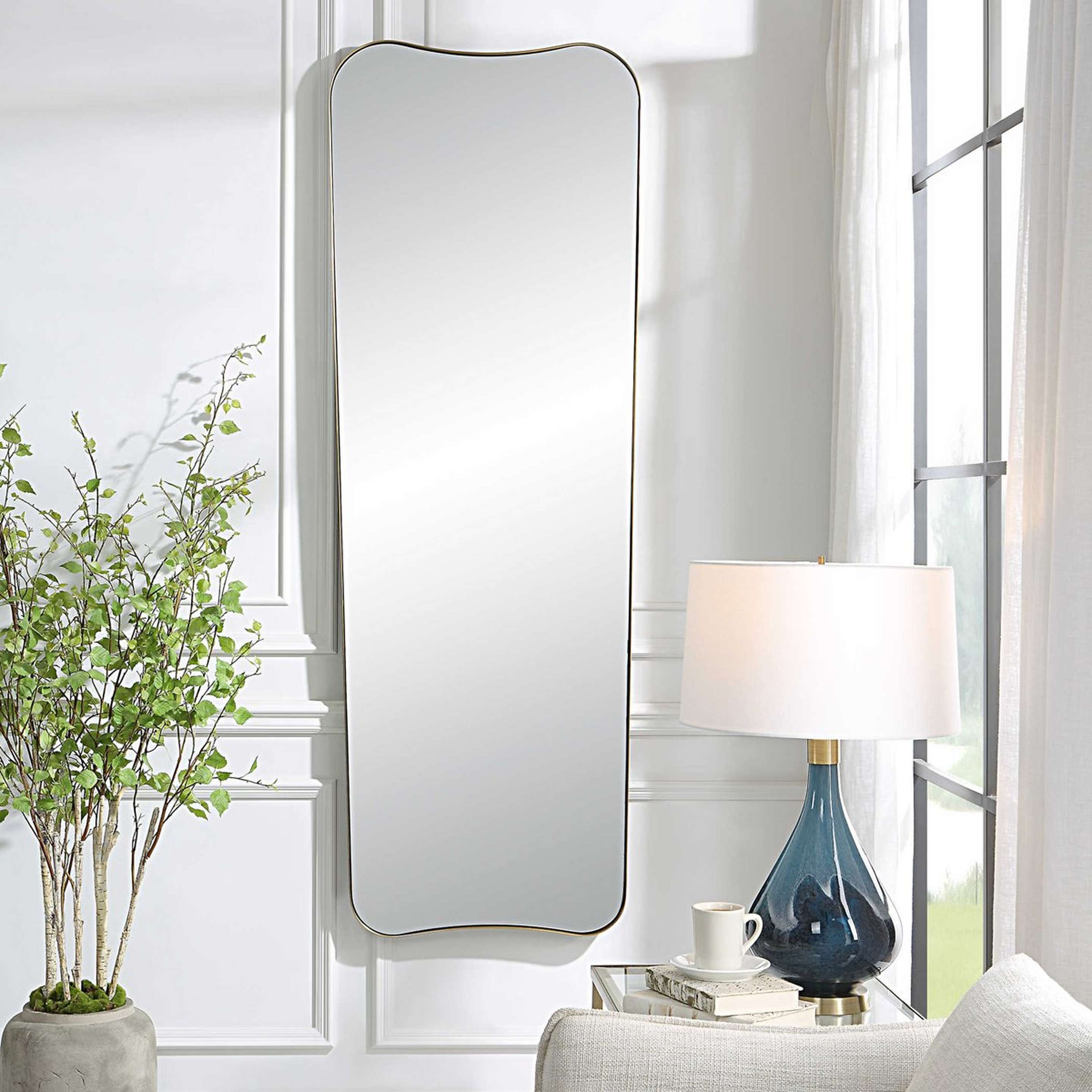 A Tolia Mirror with Antique Brass color