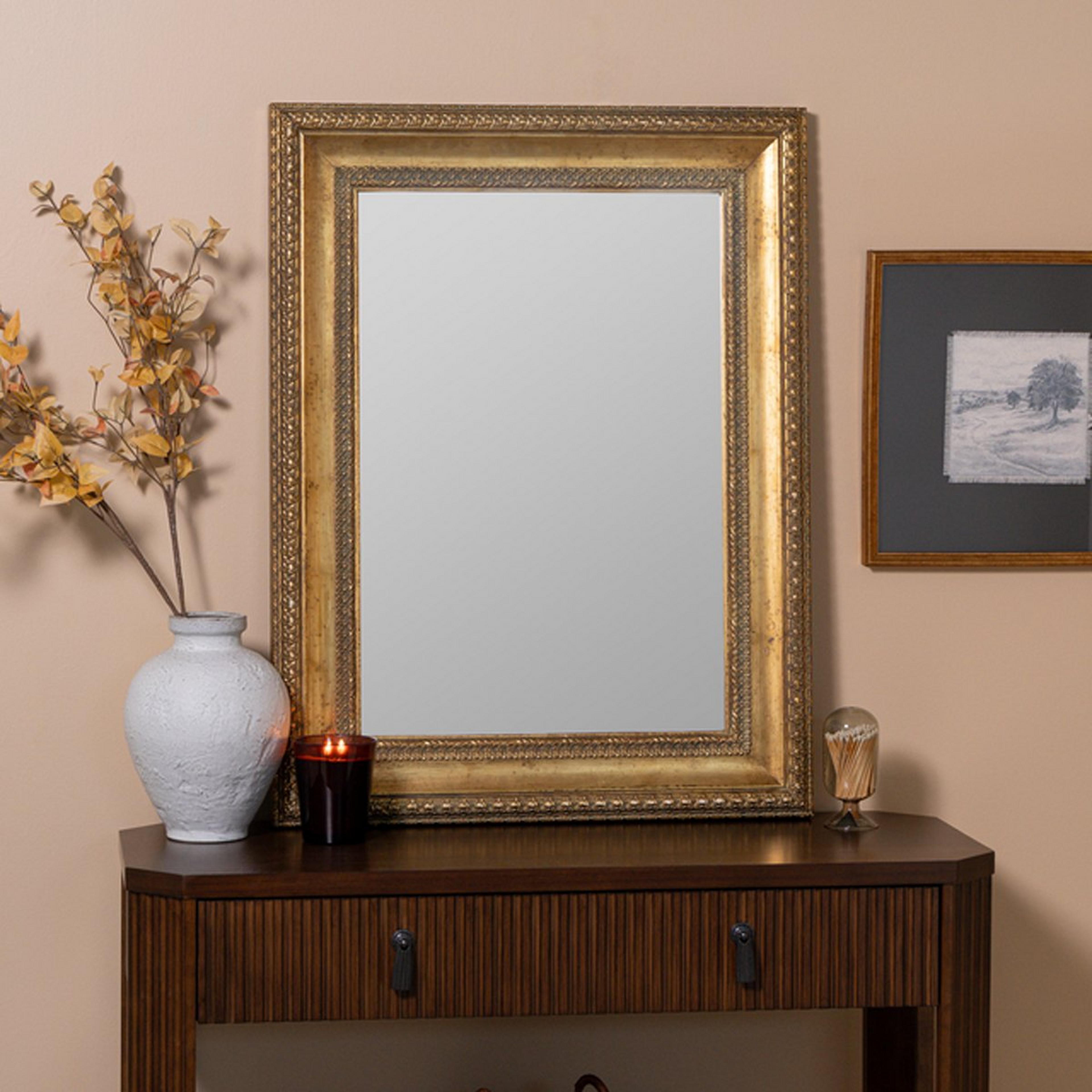 A Gayton Wall Mirror with Gold color