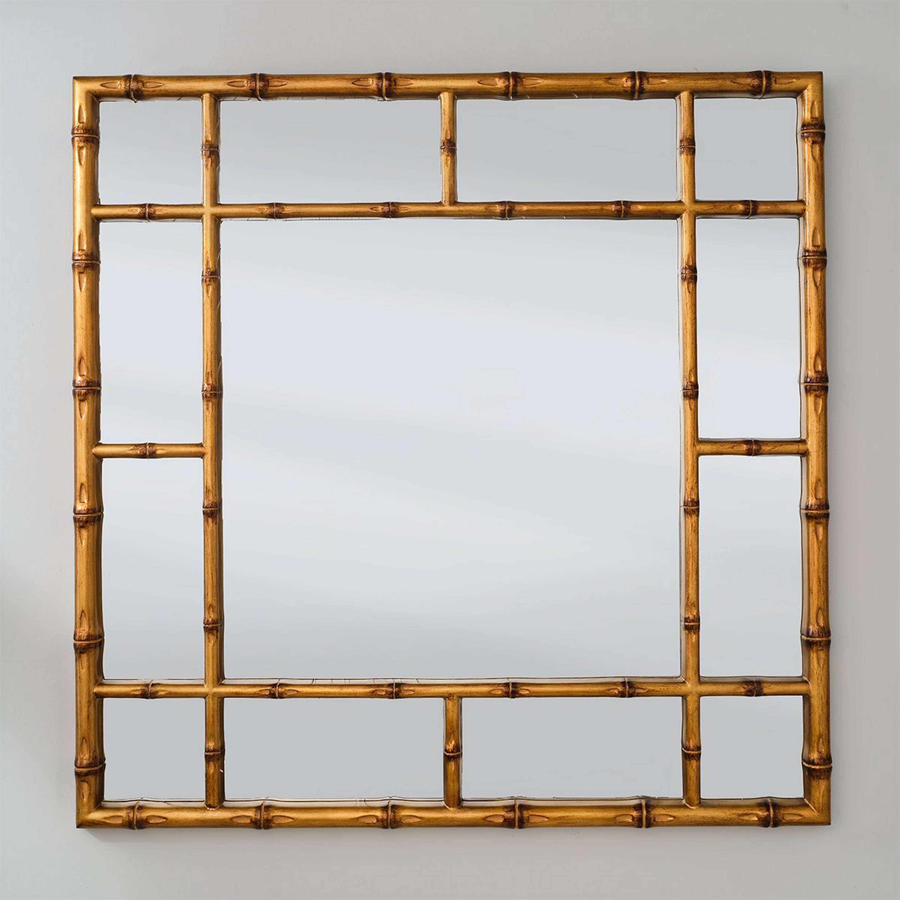 A Pamoja Mirror with Antiqued Gold color