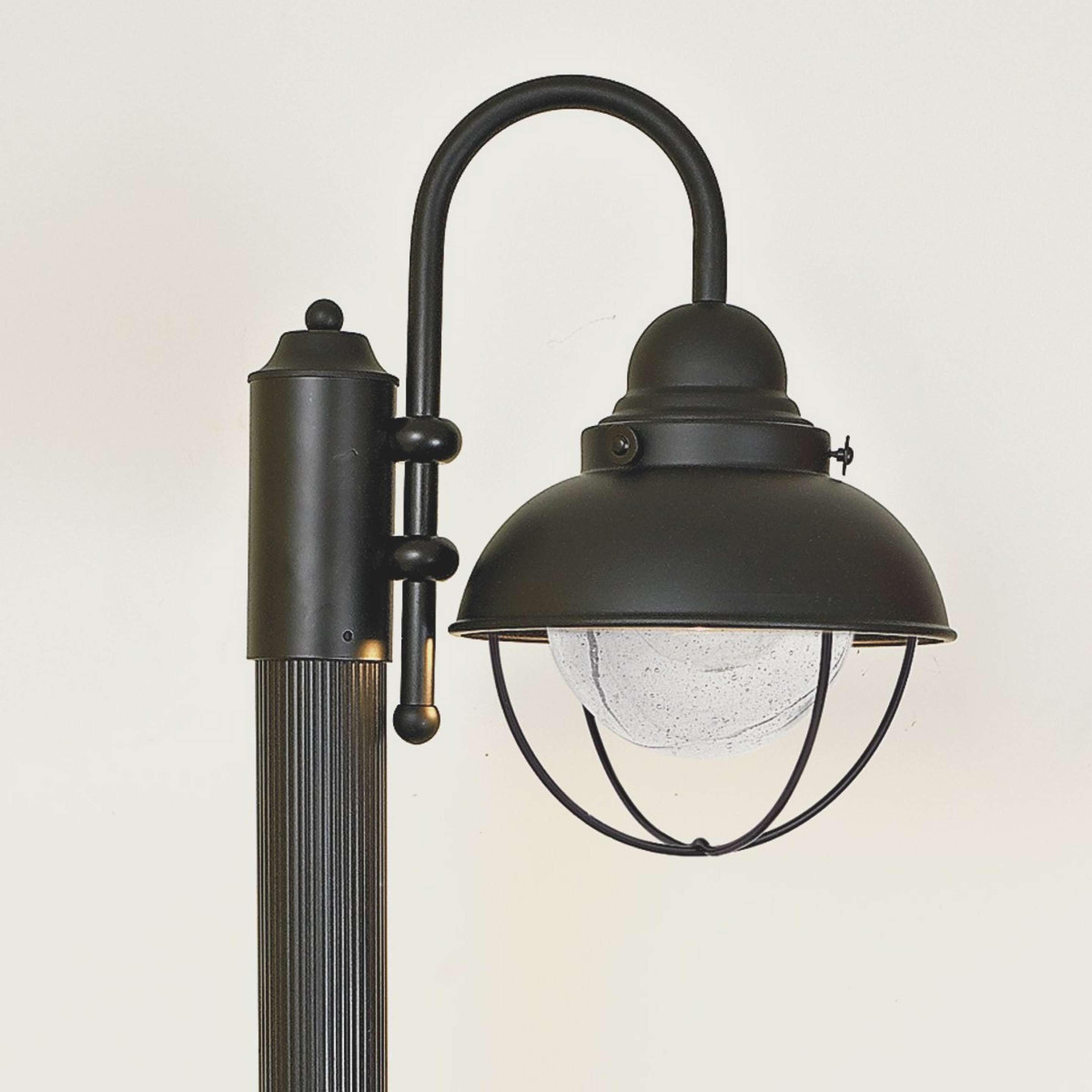 A Nantucket Outdoor Post Light with Matte Black color