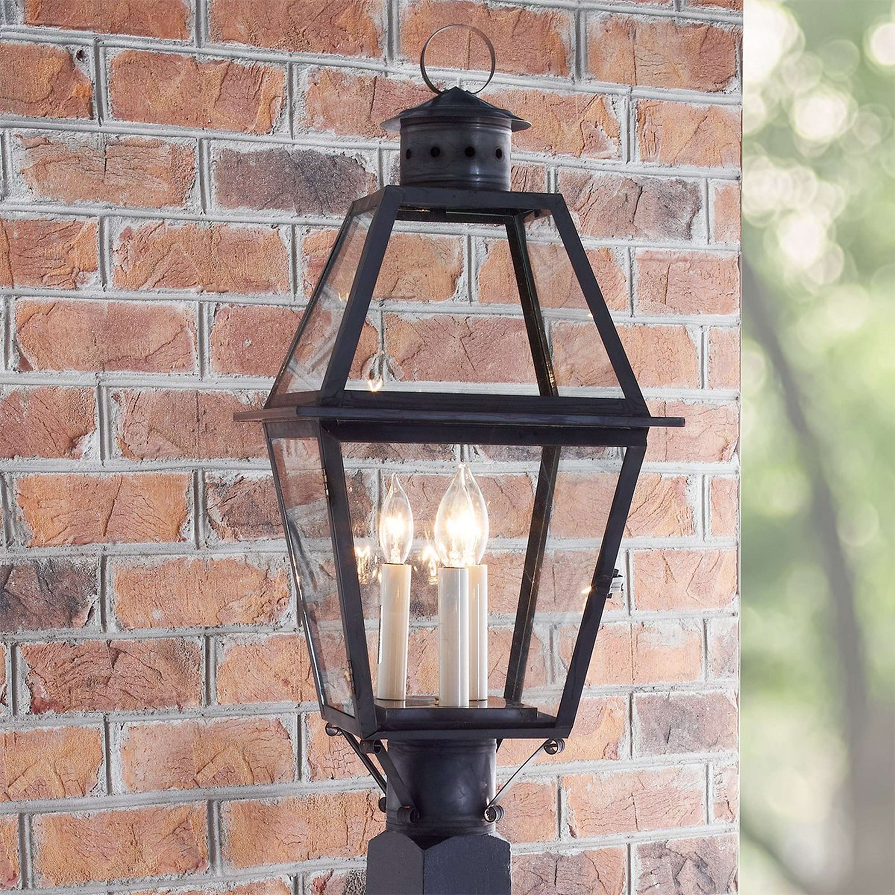 A Colonial Metalcrafts Richmond Outdoor Post Light with Darkened Copper / Clear Glass color