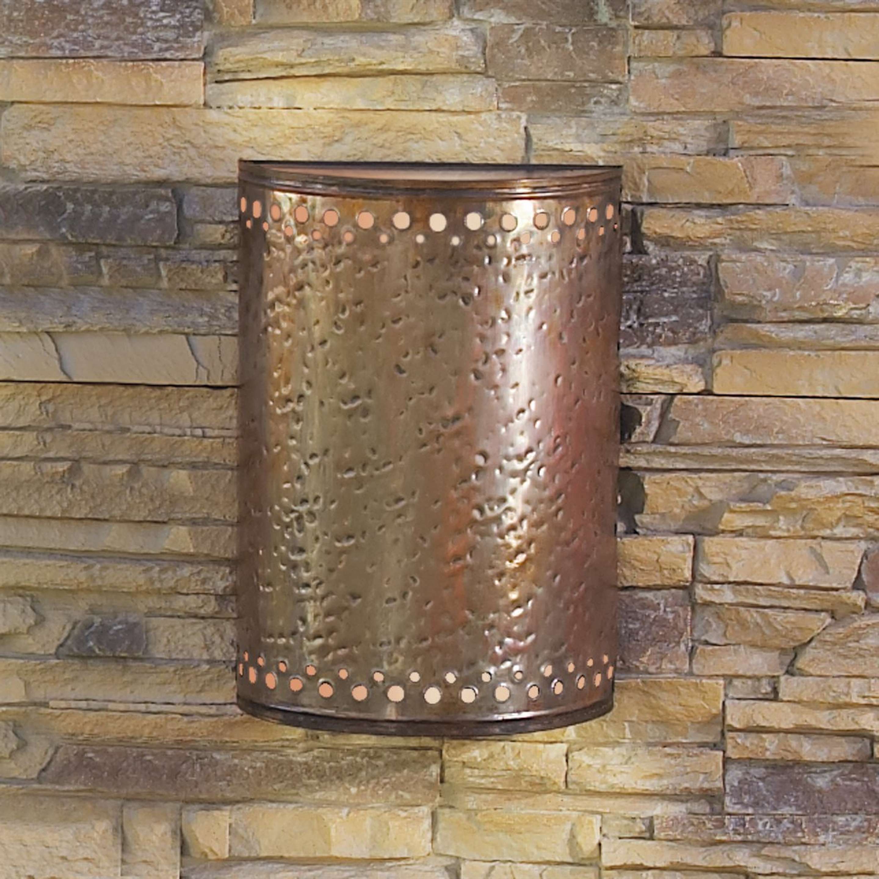 A Colonial Metalcrafts Hammered Copper Outdoor Sconce with Copper color
