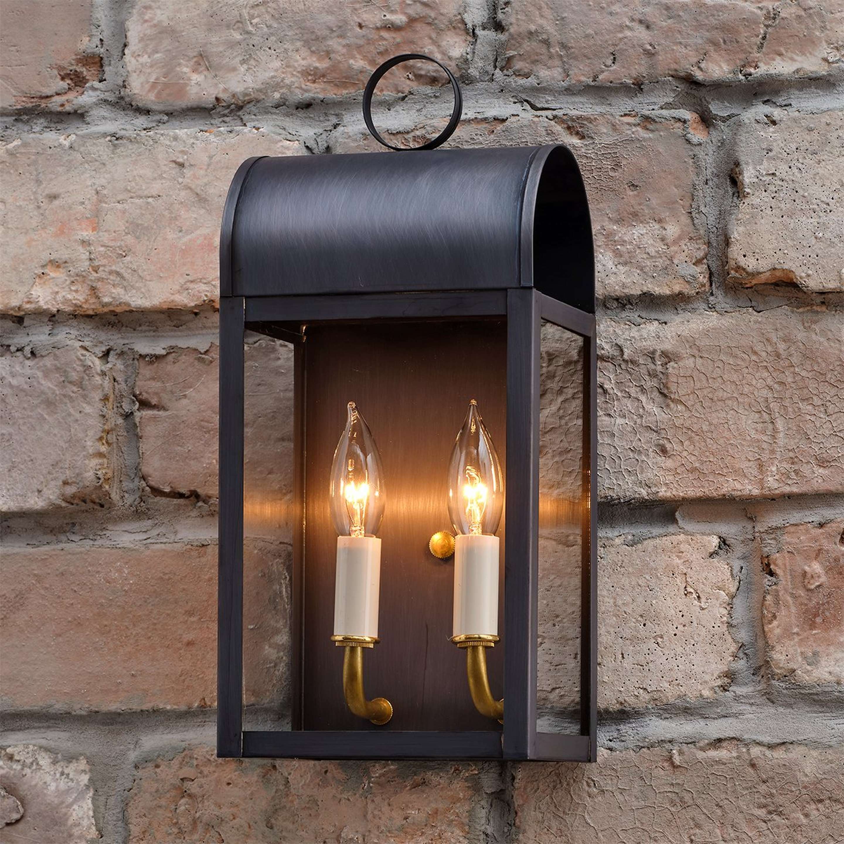 A Colonial Metalcrafts Arched Outdoor Sconce - Large with Darkened Copper / Clear Glass color