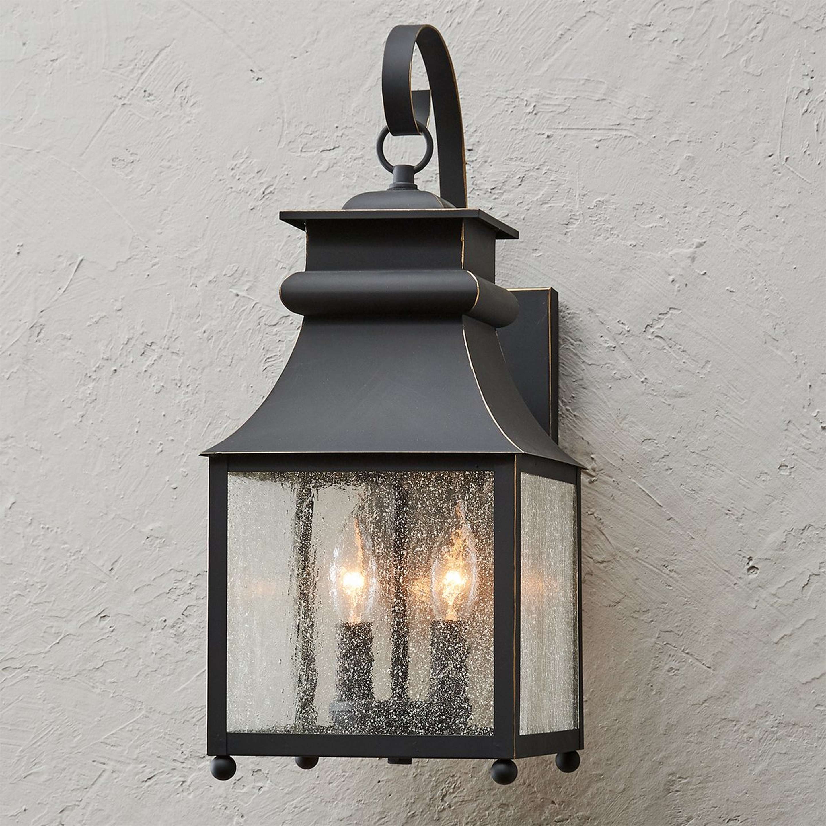 A Homesteader Seeded Glass Outdoor Sconce - 2 Light with Bronze color