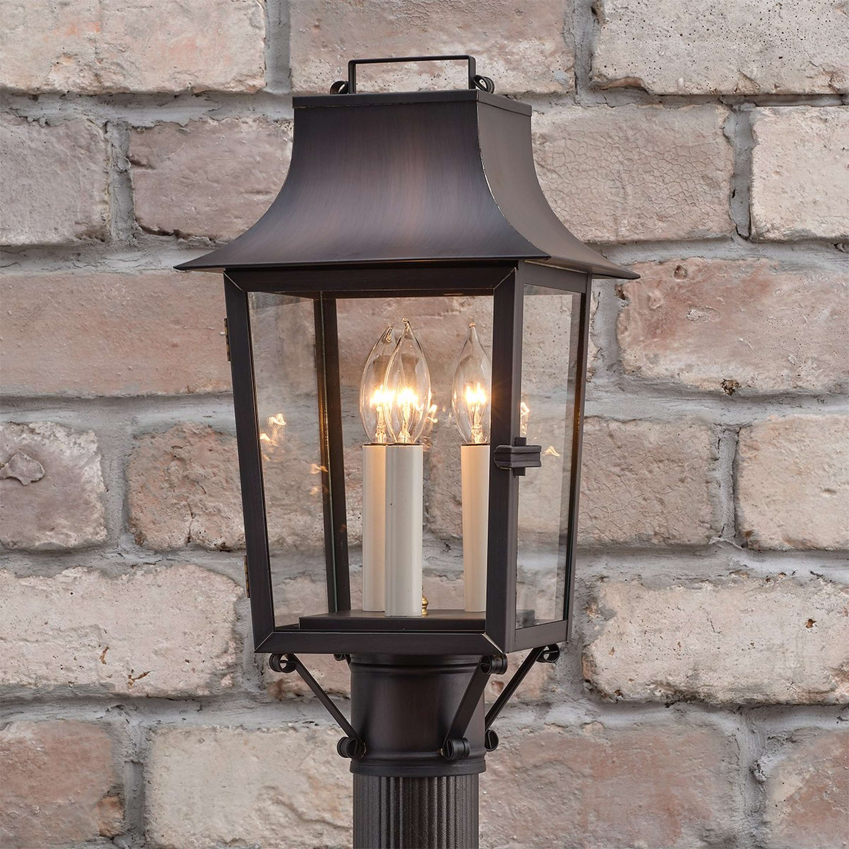 A Colonial Metalcrafts Georgian Tapered Outdoor Post Light with Darkened Copper / Clear Glass color